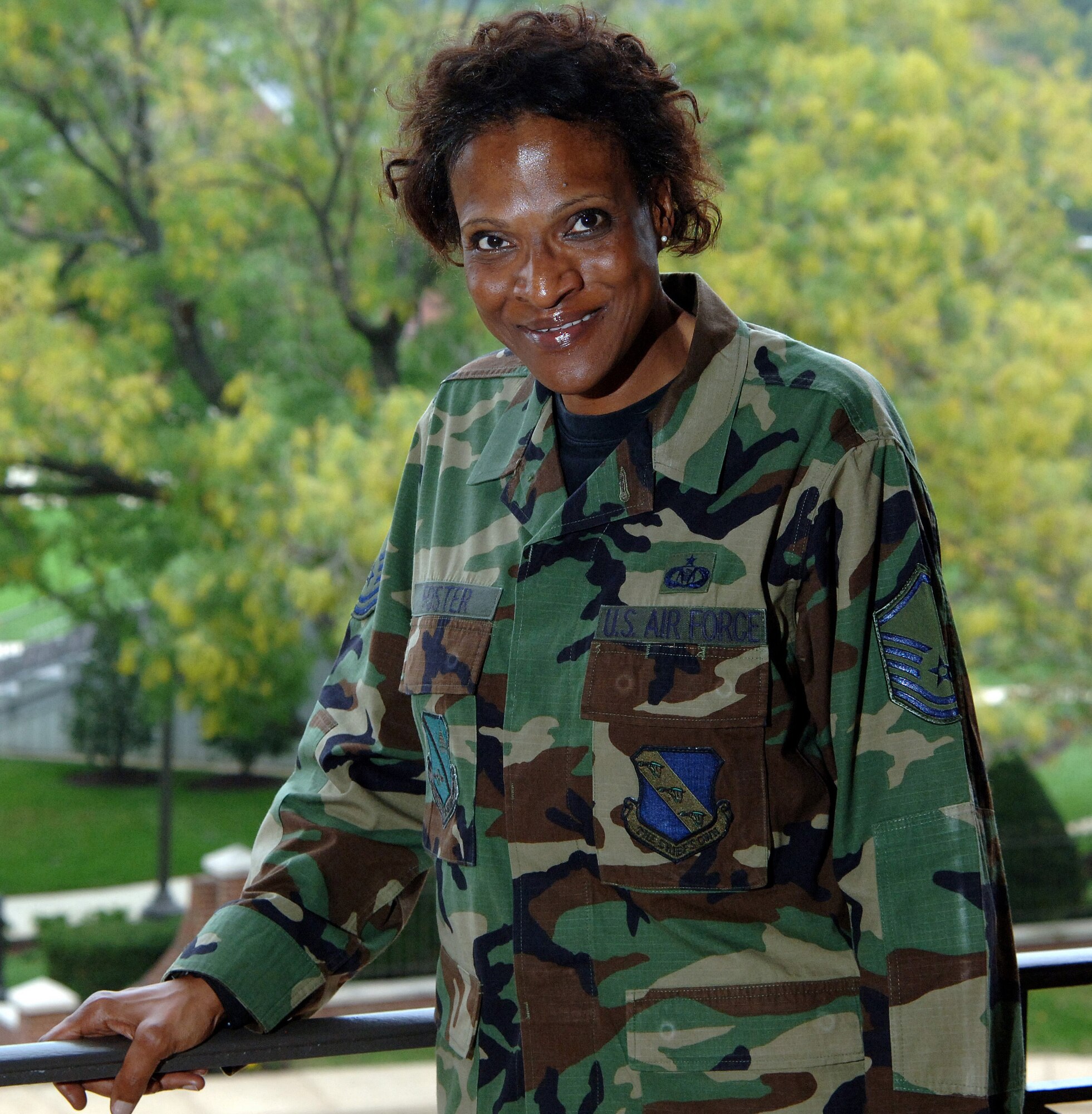 Master Sgt. Valarie Foster stands on a balcony of the wing headquarters building, Oct. 11 at Bolling Air Force Base,  D.C. Sergeant Foster is a supervisor of the operations center with the District of Washington (U.S. Air Force photo/Tech. Sgt. Larry A. Simmons)