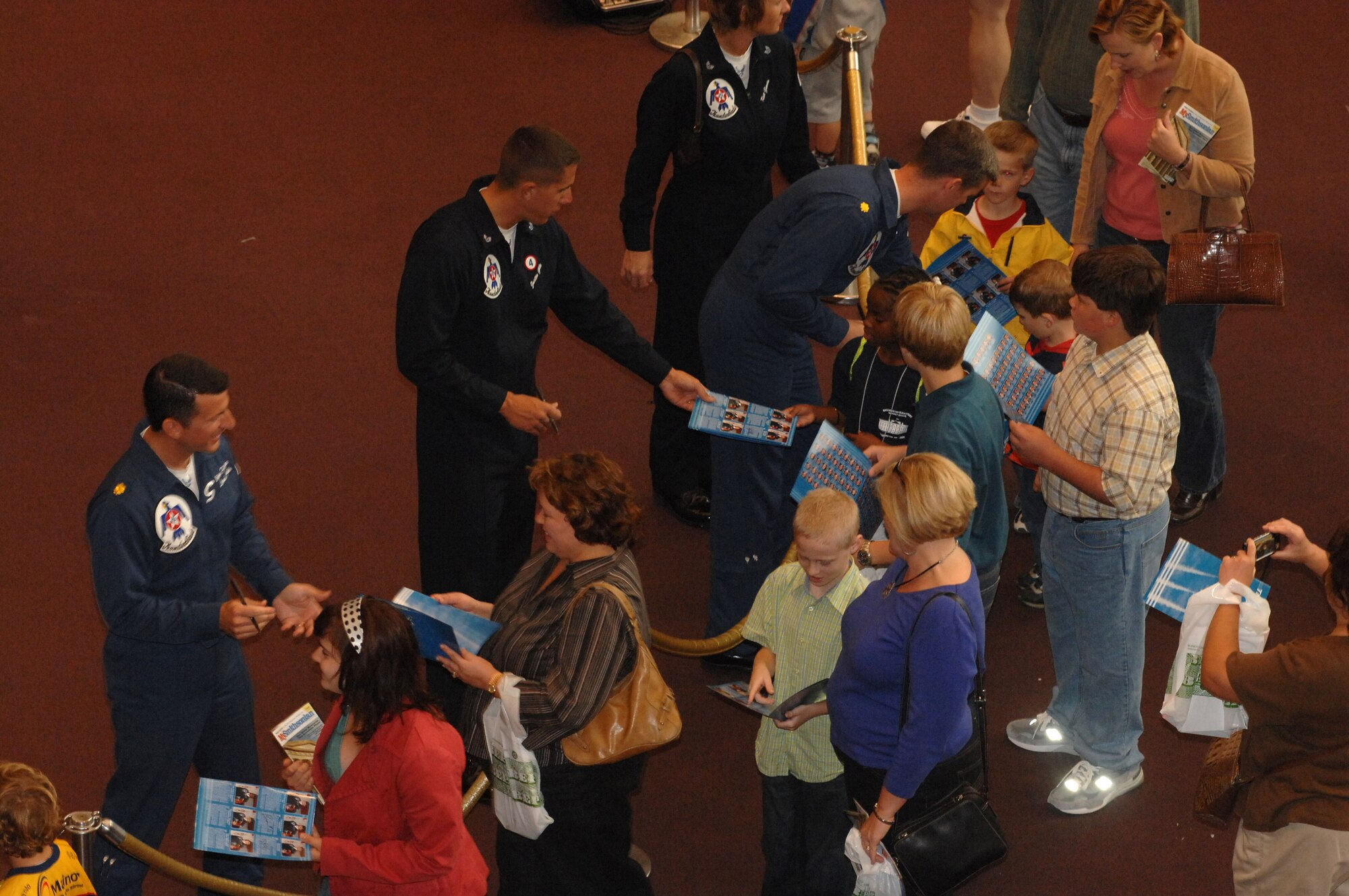 The Air Force Thunderbirds demonstration team was at the Smithsonian Air and Space Museum Oct. 11 in Washington, D.C. Team members signed autugraphs and were at the Smithsonian as part of a week-long series of events that will culminate with the opening of the Air Force Memorial Oct. 14. (U.S. Air Force photo/Master Sgt. Gary R. Coppage) 
