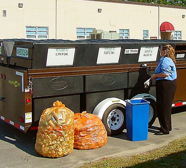 A Team Pope member takes advantage of the new recycling trailer located next to the Wood Hobby Shop. Anyone from Pope can drop off recyclable materials from home or work. (Courtesy photo)