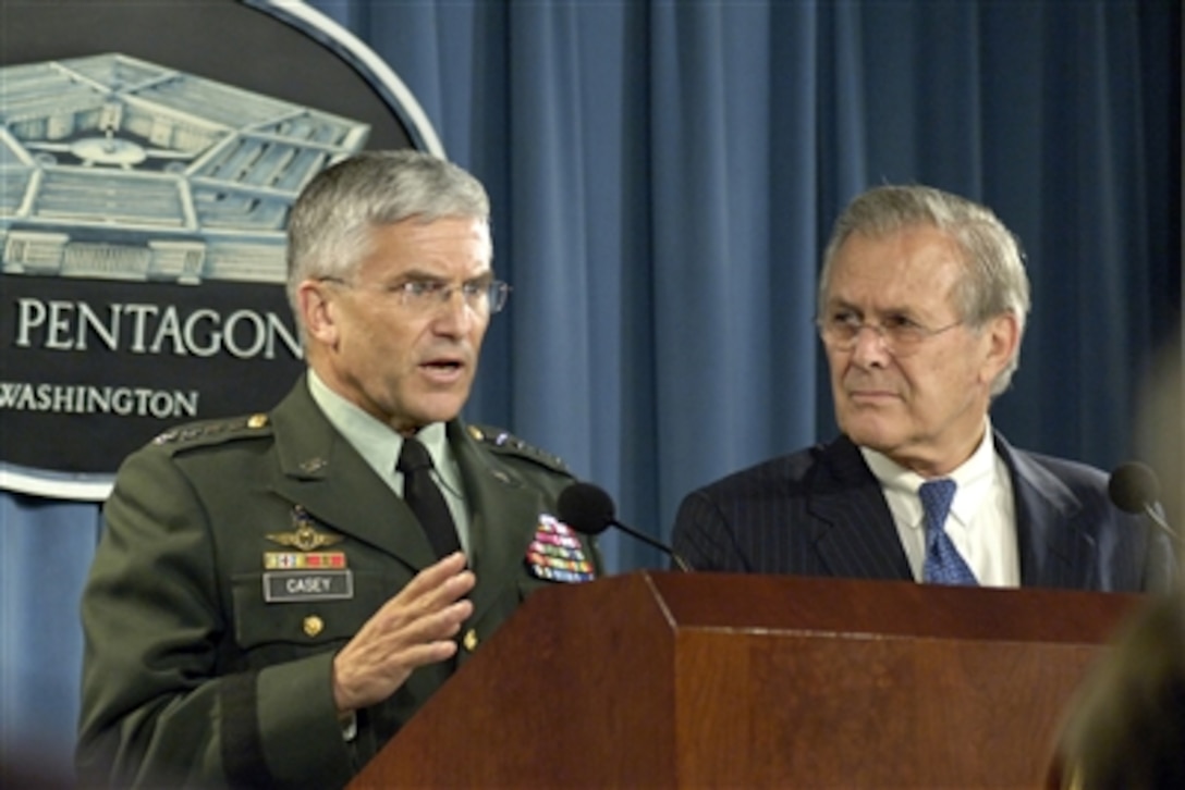 U.S. Army Gen. George Casey, left, commander, Multinational Force-Iraq, joins Defense Secretary Donald H. Rumsfeld at a Pentagon press briefing, to give reporters an update on the situation in Iraq, Oct. 11, 2006.  
