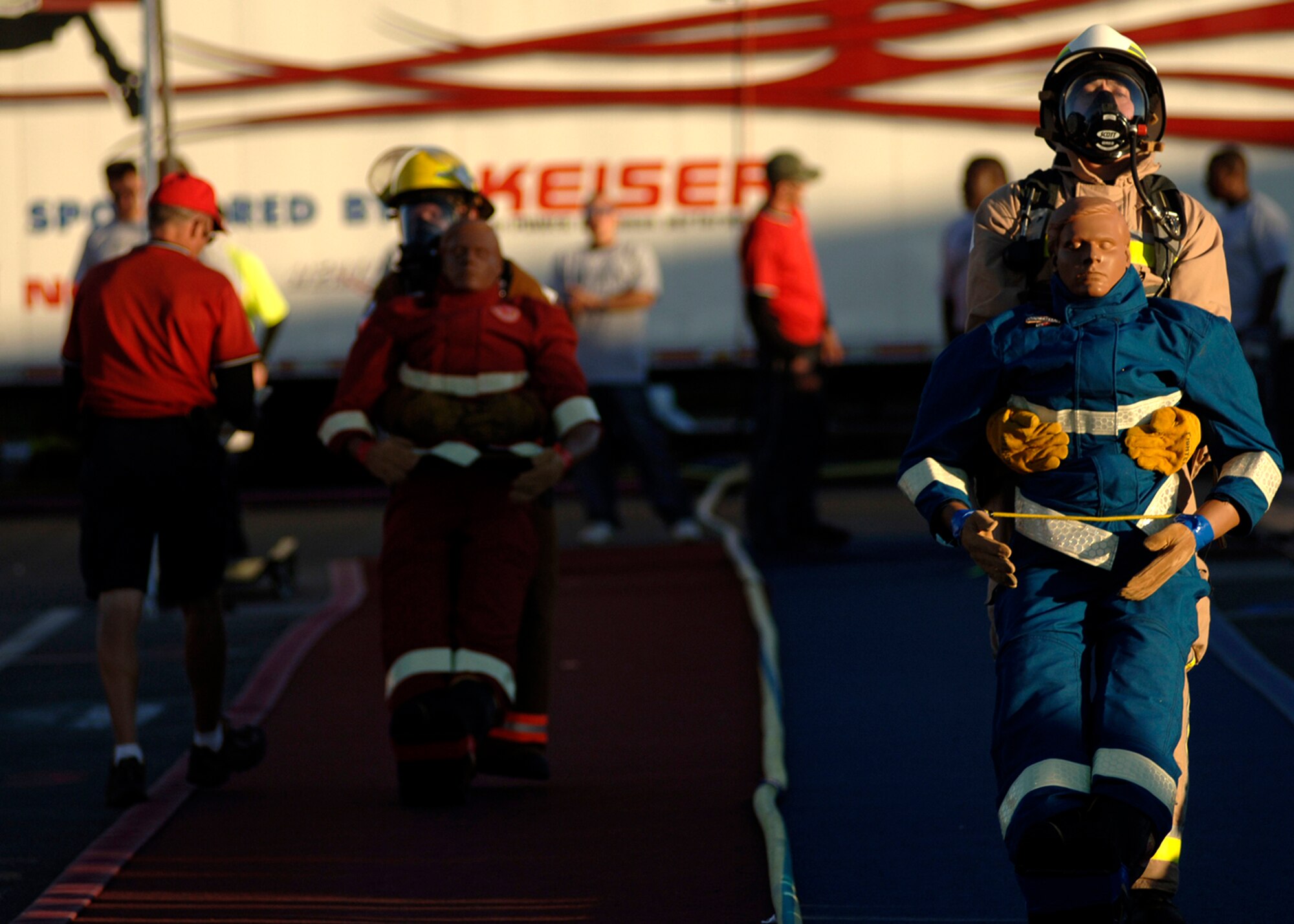 Paul Weinberg, Zoll Medical, carries a 170-pound dummy while finishing the last portion of the Firefighters Combat Competition at Morrow, Ga., Oct. 13, 2006.  (U. S. Air Force photo/Tech. Sgt. Cecilio M. Ricardo Jr.)
