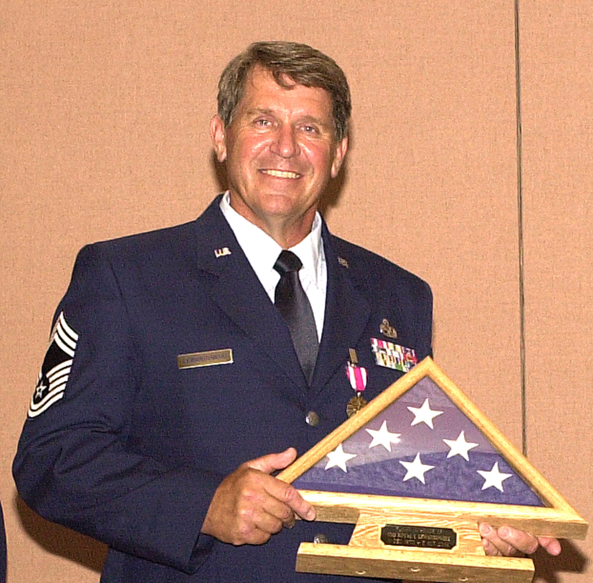 Air Force Reservist Chief Master Sergeant Royal Lewandowski, 940th Aircraft Maintenance Squadron Superintendent, retired Sept. 9, 2006 at Beale Air Force Base, Calif. after 36 years of military service.  He was with the 940th Air Refueling Wing for 34 of those years.  Chief Lewandowski advises Airmen to enjoy their career and "be proactive in following your dreams. Take advantage of opportunities, they broaden your scope of experience and almost always result in new avenues of opportunity and advancement." (U.S. Air Force photo/Staff Sgt. Luke Johnson)                         