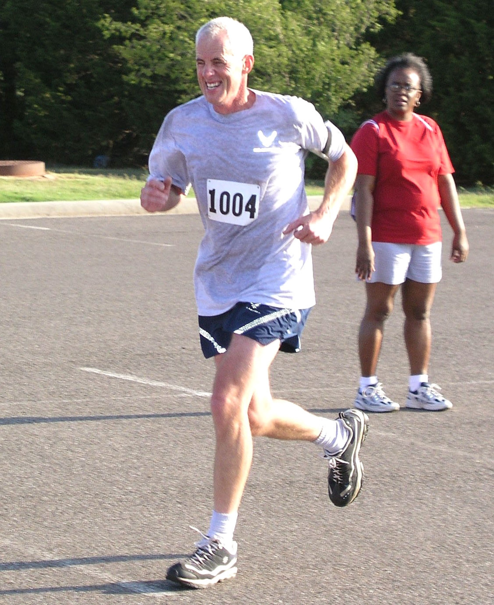 Master Sgt. Matt Thomas runs in a 10K. Sergeant Thomas, a jet engine mechanic for the 513th Aircraft Maintenance Squadron at Tinker Air Force Base, Okla., lost 122 pounds and shaved 13.5 inches off his abdominal circumference in 14 months. (U.S. Air Force photo)