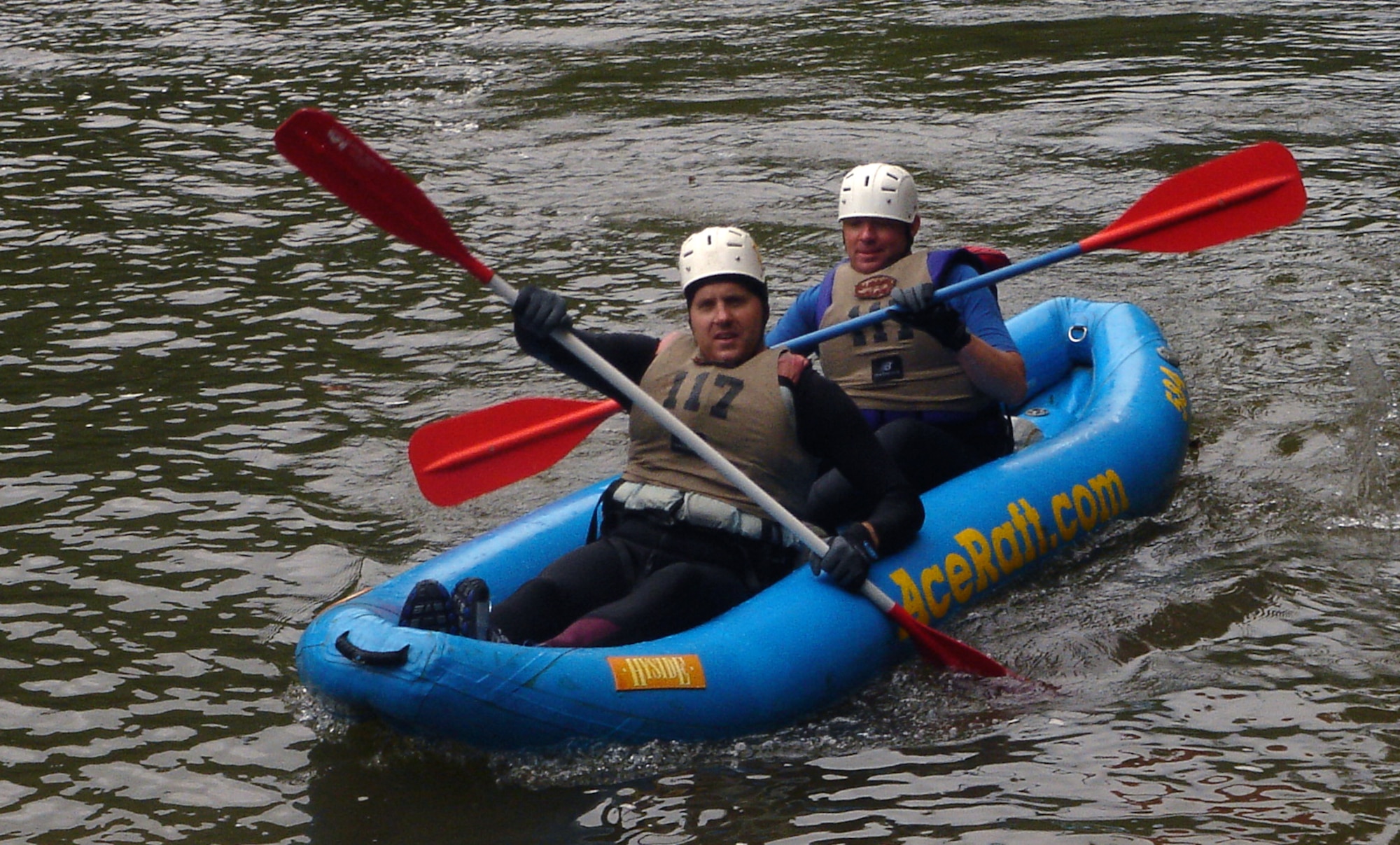 Dick Fulton and Mike Sonderman, members of the Defense Finance Accounting Service and 460th Comptroller Squadron Wilderness Challenge team, DFASt, paddle in after completing the two-person kayak event. The team competed against 50 military teams in six events that totaled 53 miles Oct. 6 and 7 and won first out of five Air Force teams and 16th out of 51 total teams.                             