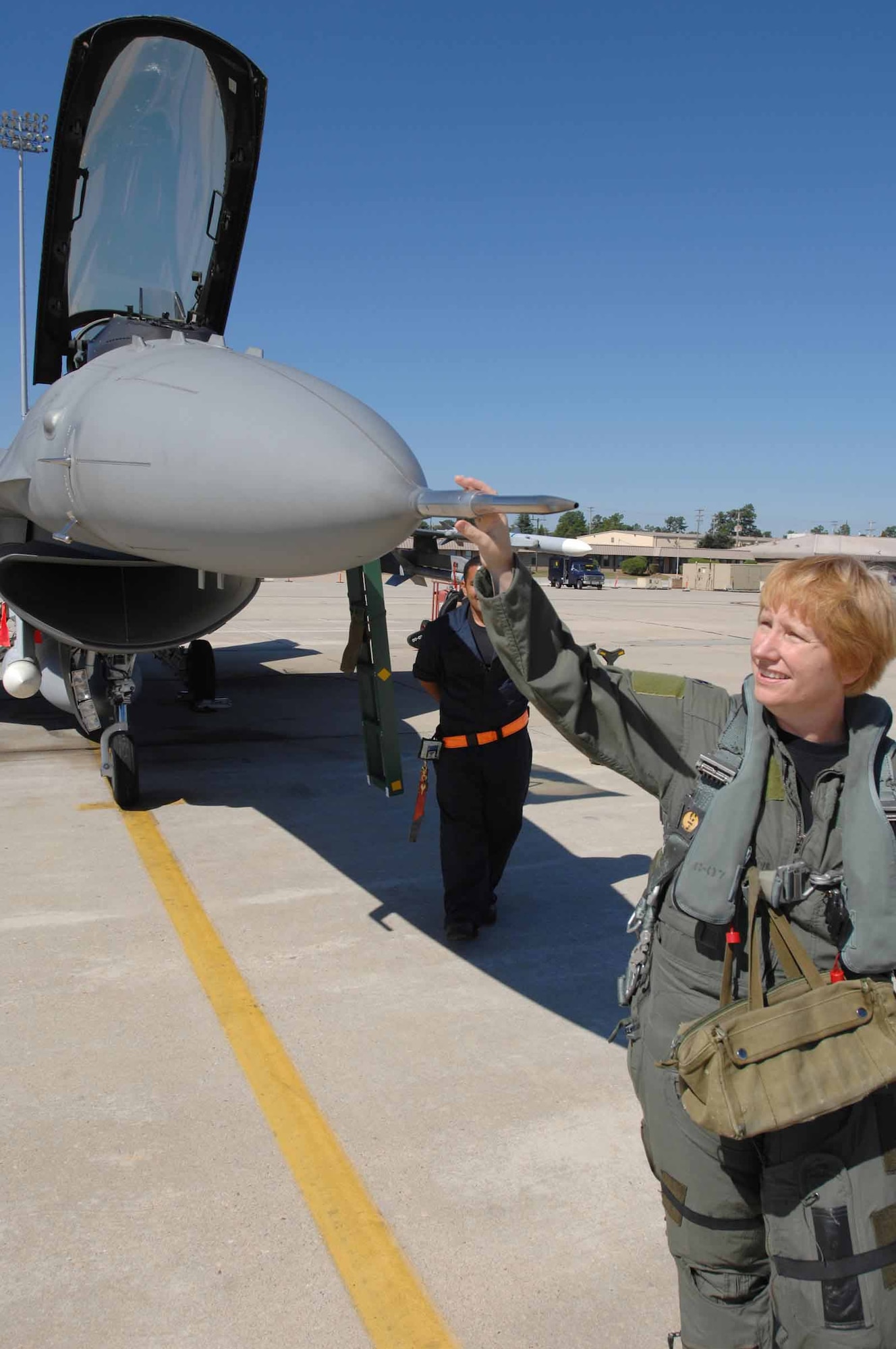 Lt. Col. Sharon Preszler, 20th Fighter Wing staff director and Commander's Action Group director, prepares for her fini flight Thursday at Shaw. Col. Preszler was the first female active-duty fighter pilot. (U.S. Air Force photo/Staff Sgt. Josef Cole III)