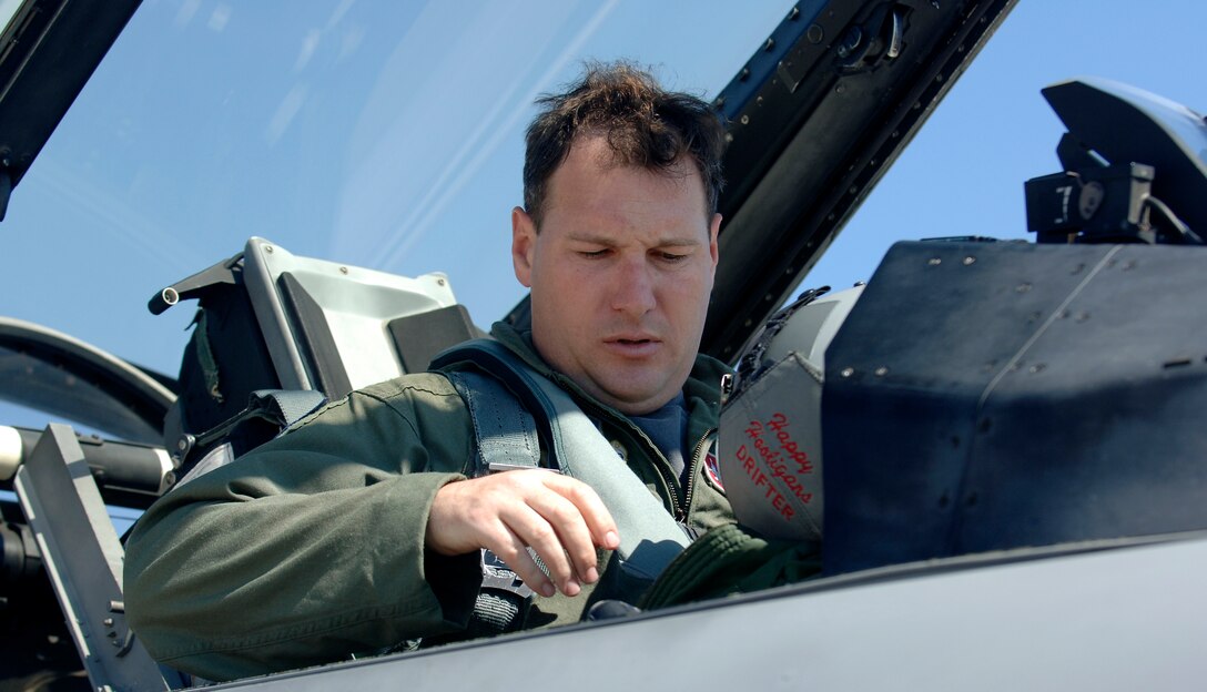 Major Watson  F-16 pilot   from the 119 Fighter Wing is shown doing it's mandatory check downs before taking it's next flight on October 3, 2006 on Langley Air Force Base , Virginia.