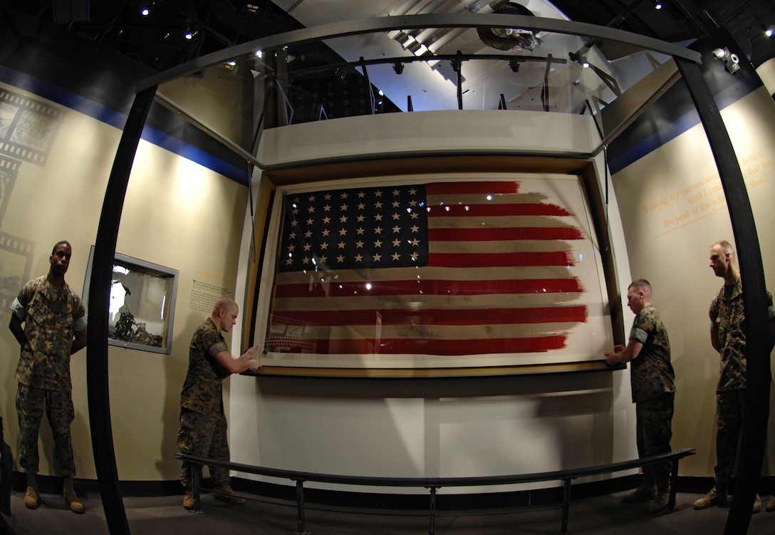 The original American flag raised on Mount Suribachi, Iwo Jima, during World War II is installed in its new home at the National Museum of the Marine Corps Quantico, Va, Oct. 13, 2006. The museum is due to open on the Marine Corps birthday this year, Nov. 10. 