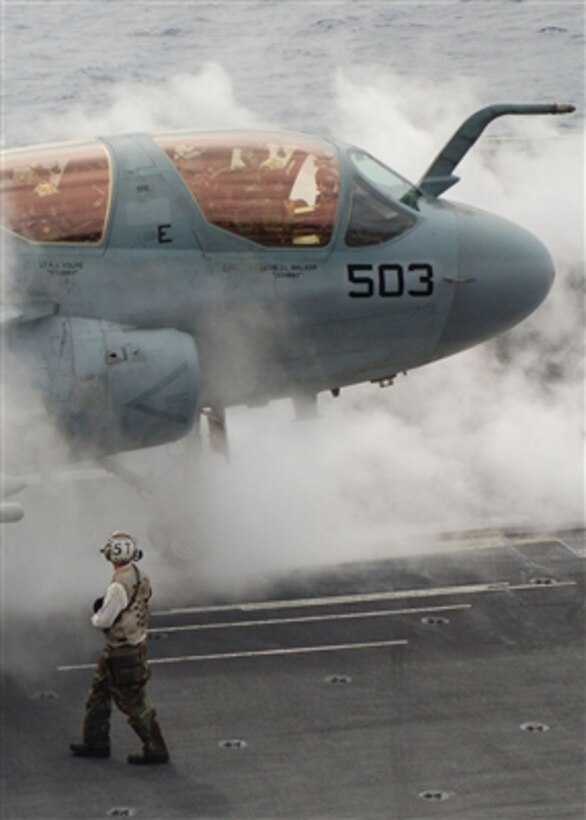 An EA-6B Prowler aircraft prepares to launch from one of the four steam-powered catapults on the flight deck of the nuclear-powered aircraft carrier USS John C. Stennis (CVN 74) on Oct. 8, 2006.  The Stennis is participating in a composite training unit exercise in the Pacific Ocean.  