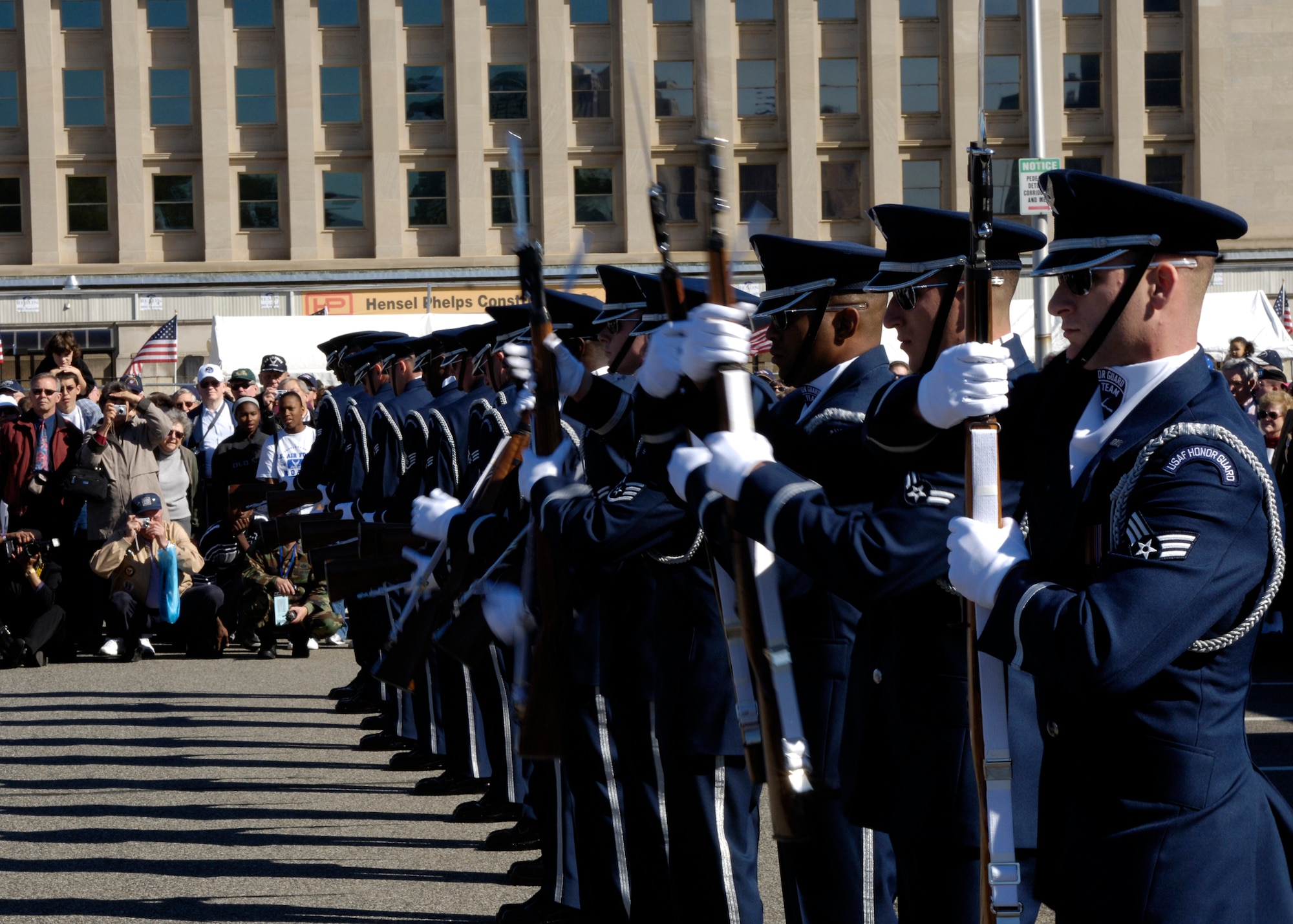 Members of the United States Air Force Drill Team perform during the Air Force open house at the Pentagon on Saturday, Oct. 14, 2006. The open house is running in conjunction with the official ceremony to dedicate the Air Force Memorial. President George W. Bush will join Senior Defense Dept. and Air Force officials in a ceremony to present the memorial to the Nation. Desiged by the late James Ingo Freed the memorial with its three soaring spires inspired by the U.S. Air Force Thunderbirds bomb burst manuever, pays tribute to and honors the patriotic men and women of the U.S. Air Force and its predeccessor organizations. An open house will run near the Pentagon in conjunction with the dedication ceremony which will feature performances by the U.S. Air Force Band, the U.S. Air Force Honor Guard drill team, and will culminate with a concert featuring country music performer LeeAnn Womack. (U.S. Air Force photo/Tech. Sgt. Rebecca F. Corey) 