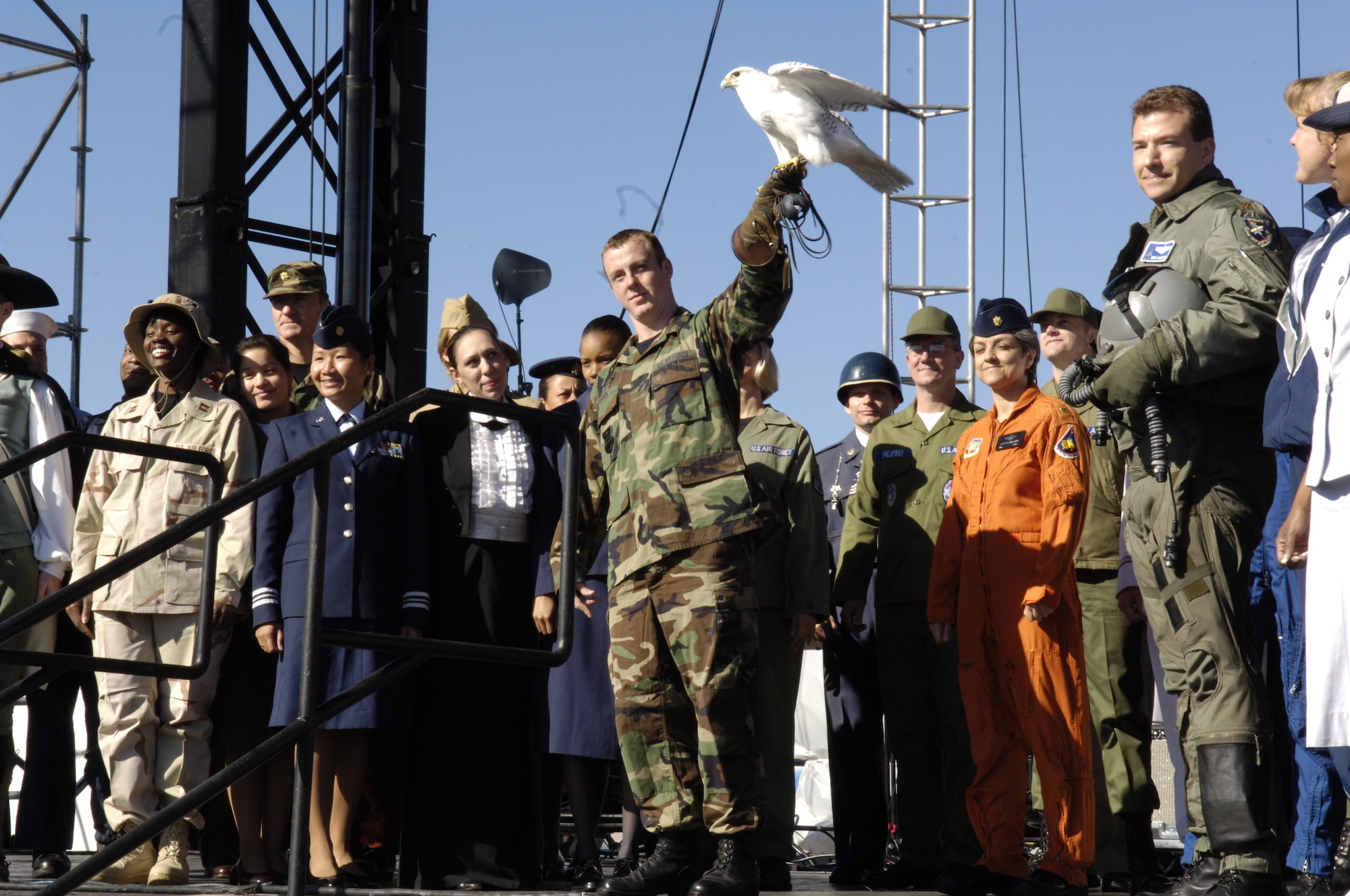 Current and former members of the United States Air Force and its predecessor organizations present a parade of uniforms at an Air Force open house at the Pentagon on Saturday, Oct. 14, 2006. The open house is running in conjunction with the official ceremony to dedicate the Air Force Memorial. President George W. Bush will join Senior Defense Dept. and Air Force officials in a ceremony to present the memorial to the Nation. Designed by the late James Ingo Freed the memorial with its three soaring spires inspired by the U.S. Air Force Thunderbirds bomb burst manuever, pays tribute to and honors the patriotic men and women of the U.S. Air Force and its predeccessor organizations. An open house will run near the Pentagon in conjunction with the dedication ceremony which will feature performances by the U.S. Air Force Band, the U.S. Air Force Honor Guard drill team, and will culminate with a concert featuring country music performer LeeAnn Womack. (U.S. Air Force photo/Senior Airman Desiree L. Andrejcik)