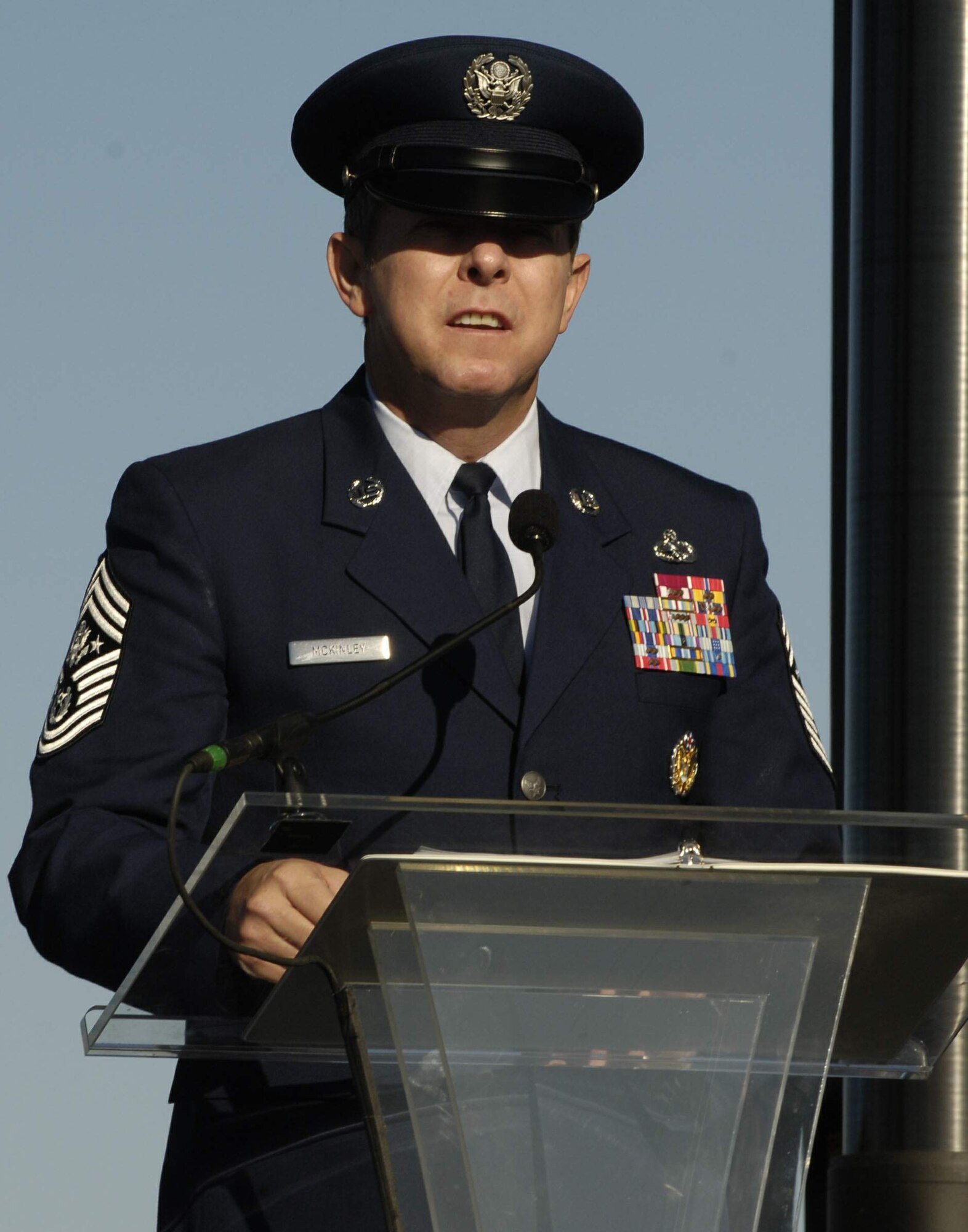 Chief Master Sergeant of the Air Force Rodney J. McKinley welcomes  90 young men and women into the U.S. Air Force on Saturday, Oct. 14, 2006, during open house activities at the Pentagon prior to the official dedication ceremony of the Air Force Memorial. President George W. Bush will join Senior Defense Dept. and Air Force officials in a ceremony to present the memorial to the Nation. Desiged by the late James Ingo Freed the memorial with its three soaring spires inspired by the U.S. Air Force Thunderbirds bomb burst manuever, pays tribute to and honors the patriotic men and women of the U.S. Air Force and its predeccessor organizations. An open house will run near the Pentagon in conjunction with the dedication ceremony which will feature performances by the U.S. Air Force Band, the U.S. Air Force Honor Guard drill team, and will culminate with a concert featuring country music performer LeeAnn Womack. (U.S. Air Force photo/Airman 1st Class Rusti M. Caraker) 