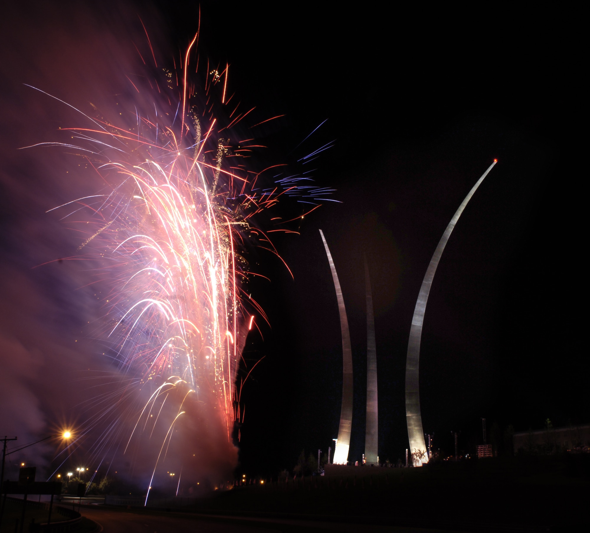 Fireworks light up the Air Force Memorial Oct. 13 at Arlington, Va., on the eve of its official dedication ceremony. President George W. Bush will join senior Defense Department and Air Force officials in a ceremony to present the memorial to the nation today. Designed by the late James Ingo Freed, the memorial with its three soaring spires inspired by the U.S. Air Force Thunderbirds bomb burst maneuver, pays tribute to and honors the men and women of the U.S. Air Force and its predecessor organizations. (U.S. Air Force photo/Senior Airman Desiree L. Andrejcik) 