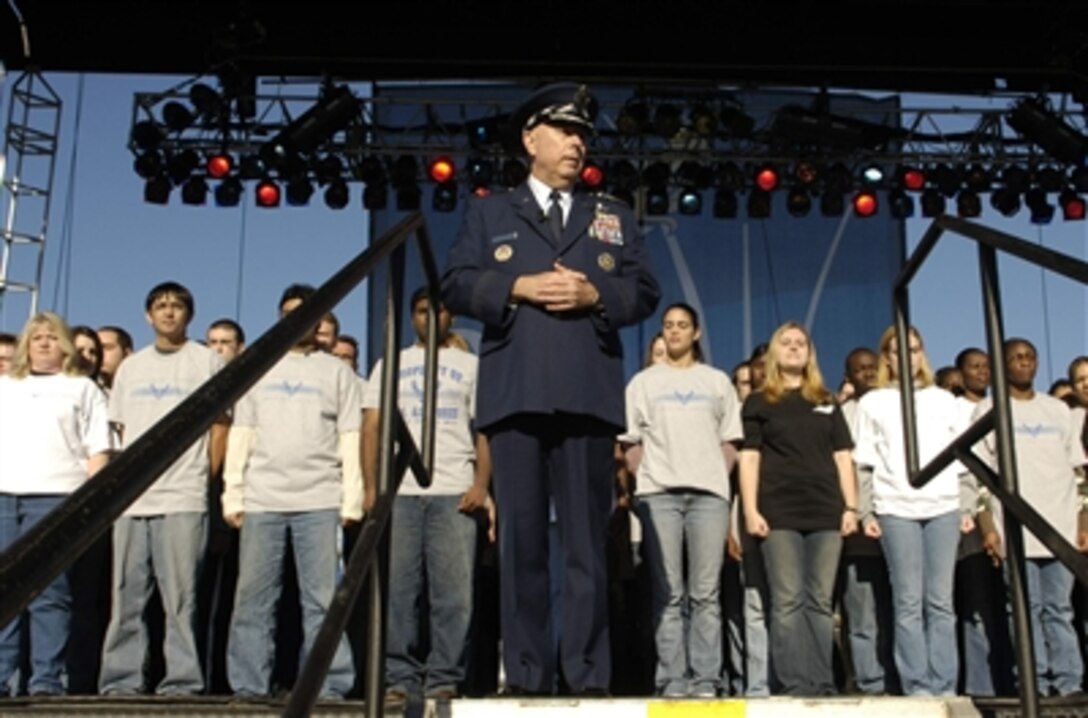 U.S. Air Force Chief of Staff Gen. T. Michael Moseley welcomes 90 young men and women into the Air Force, Oct. 14, 2006, during open house activities at the Pentagon prior to the official dedication ceremony of the Air Force Memorial.