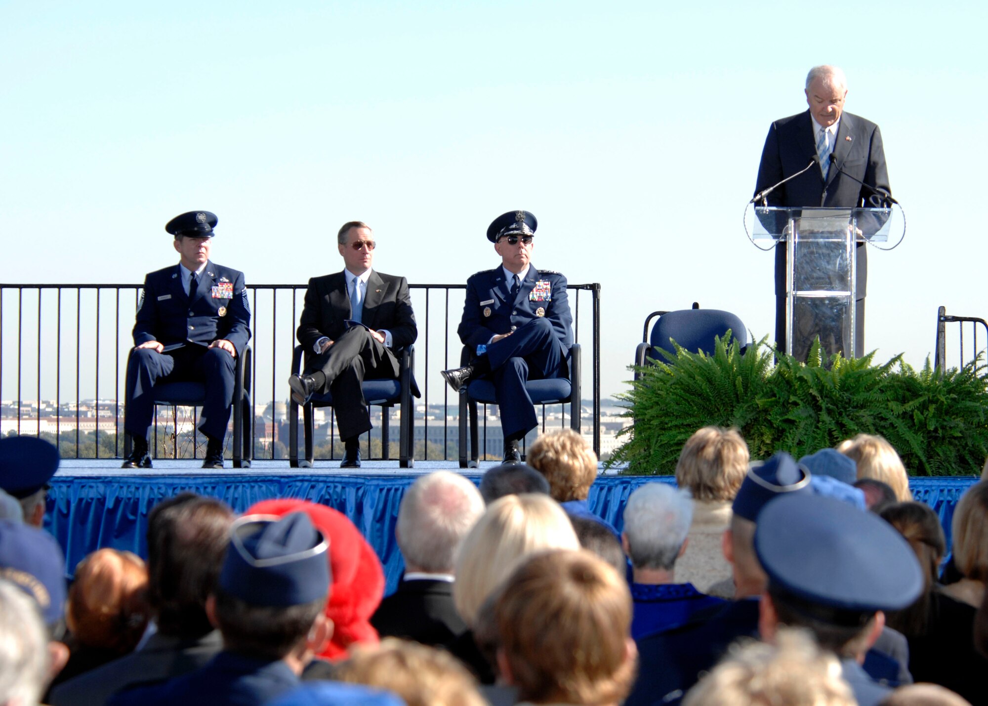 Hundreds gathered at the base of the new Air Force Memorial  as Secretary of the Air Force Michael W. Wynne officially closed the Air Force Memorial commemoration with a wreath laying ceremony in Arlington, Va., Oct. 15, 2006. Looking on are (from left) Chief Master Sgt. of the Air Force Rodney J. McKinley, Air Force Memorial Foundation Chairman Ross Perot Jr., and Air Force Chief of Staff Gen. T. Michael Moseley.  (U.S. Air Force photo/Tech. Sgt. Cohen Young) 