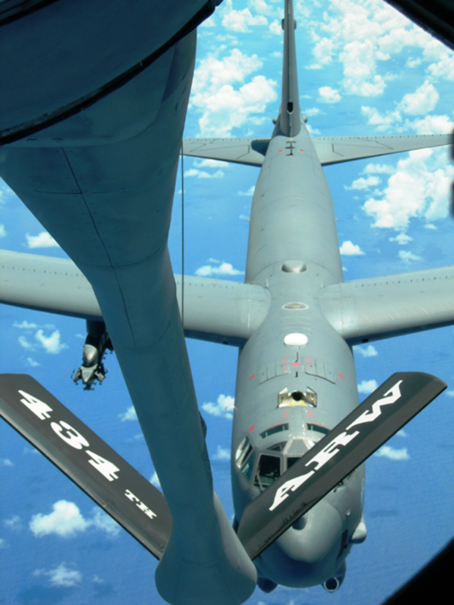 GRISSOM AIR RESERVE BASE, Ind --- A B-52 from Andersen AFB, Guam prepares to be refueled by a KC-135R Stratotanker from the 434th Air Refueling Wing.  The 434th ARW is the largest tanker unit in the Air Force Reserve Command and recently deployed to Guam to provide refueling support to aircraft in the Pacific region.  (U.S. Air Force photo/Courtesy 434th Operations Group)