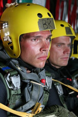 Pararescumen trainees from the 342nd Training Squadron on board a 920th Rescue Wing HC-130 wait for the order to jump during the water jump portion of Air Operations training at Patrick Air Forcc Base, Fla., Oct. 13. Twenty trainees and 13 instructors participated in this round of training