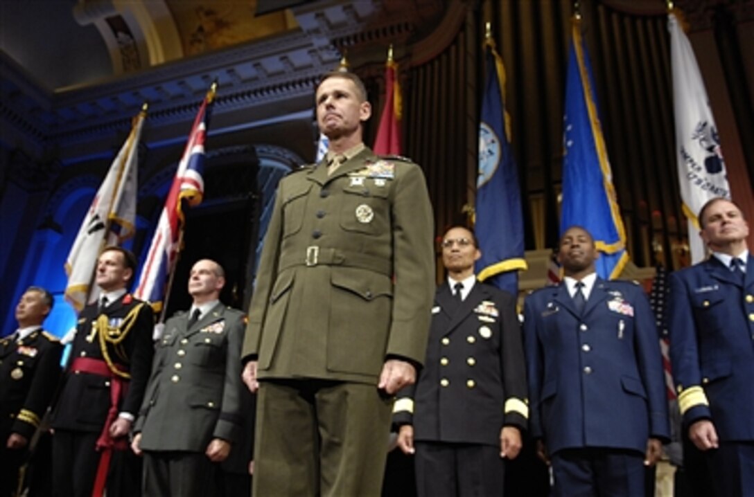 Chairman of the Joint Chiefs of Staff Marine Gen. Peter Pace participates in the opening portion of a concert to pay tribute to "Today's Heroes" at Mechanics Hall, Worcester, Mass., Oct. 15, 2006. 