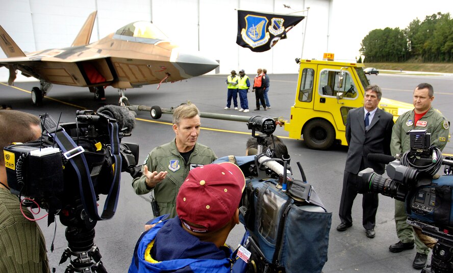 KADENA AIR BASE, Japan --  Gen. Hawk Carlisle, commander third wing, speaks to media after the roll-out of the Pacific's first combat ready F-22, destined for Elmendorf Air Force Base, Alaska. The F-22 dominates any adversary through unmatched performance achieved through stealth, supercruise speed, agility, precision and a complete view of the battlespace achieved with the advanced sensor suite embedded in the aircraft. (Photo by John Rossino) 