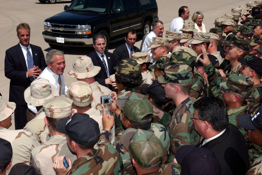 President George W. Bush greets troops from the 56th Fighter Wing at Luke Air Force Base, Ariz., August 29, 2005. The President arrived at Luke before going to an El Mirage town hall meeting to rally support for his new Medicare plan. (Photo by Senior Airman Joseph Thompson)