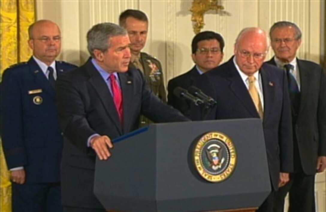 President Bush discusses the Military Commissions Act of 2006 during ceremonies at the White House today. The act enables the president to establish military commissions, and establishes procedures to try alien unlawful enemy combatants for violations of the law of war.