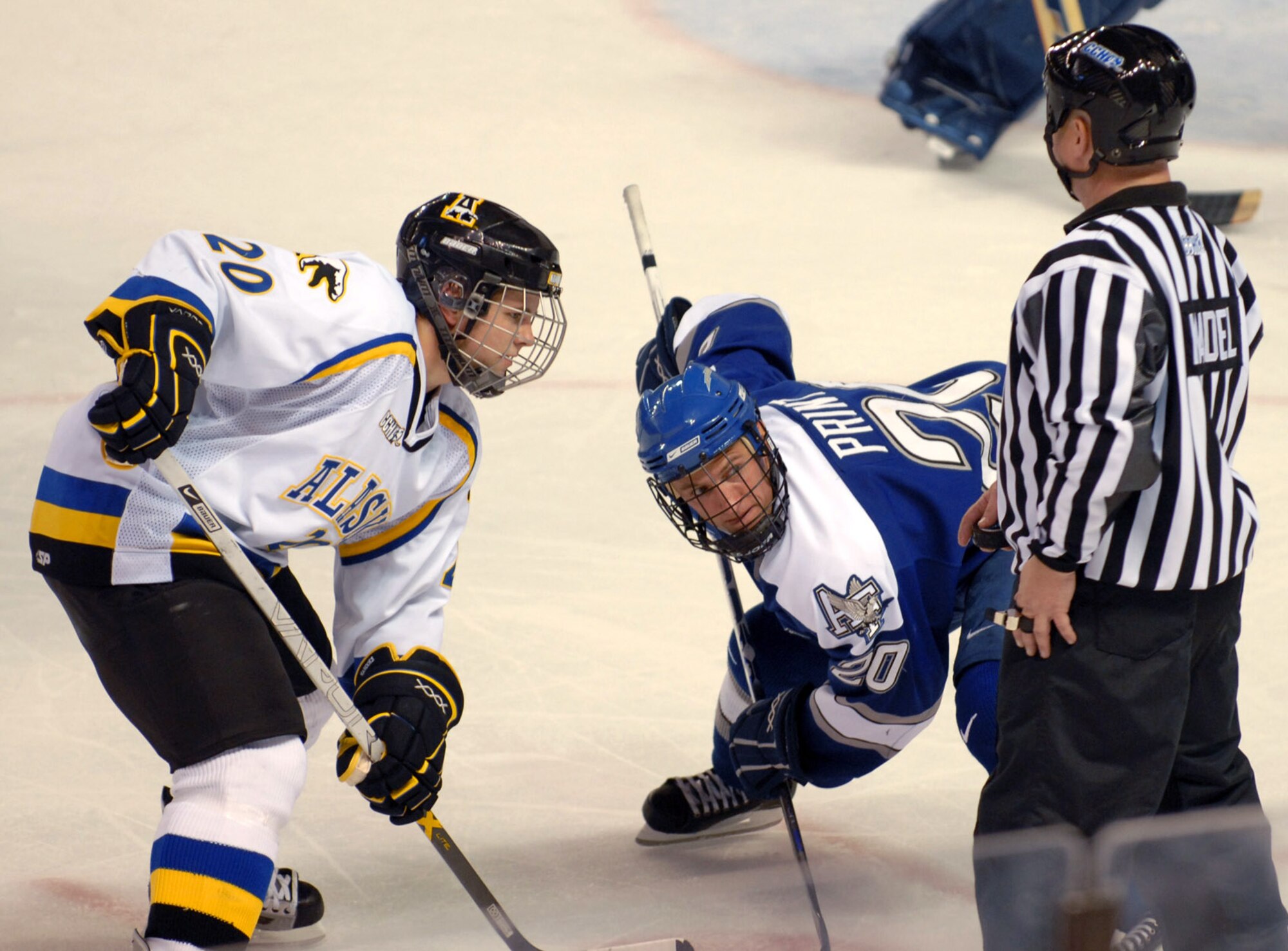 Dion Knelsen of the University of Alaska-Fairbanks Nanooks faces off against Cadet 2nd Class Josh Print of the U.S. Air Force Academy Falcons at the Carlson Center in downtown Fairbanks on Oct. 14.  The Nanooks went on to win the game 8 to 4.  The Falcons fell to 1-3 for the season.  (U.S. Air Force photo/Airman Jonathan Snyder)