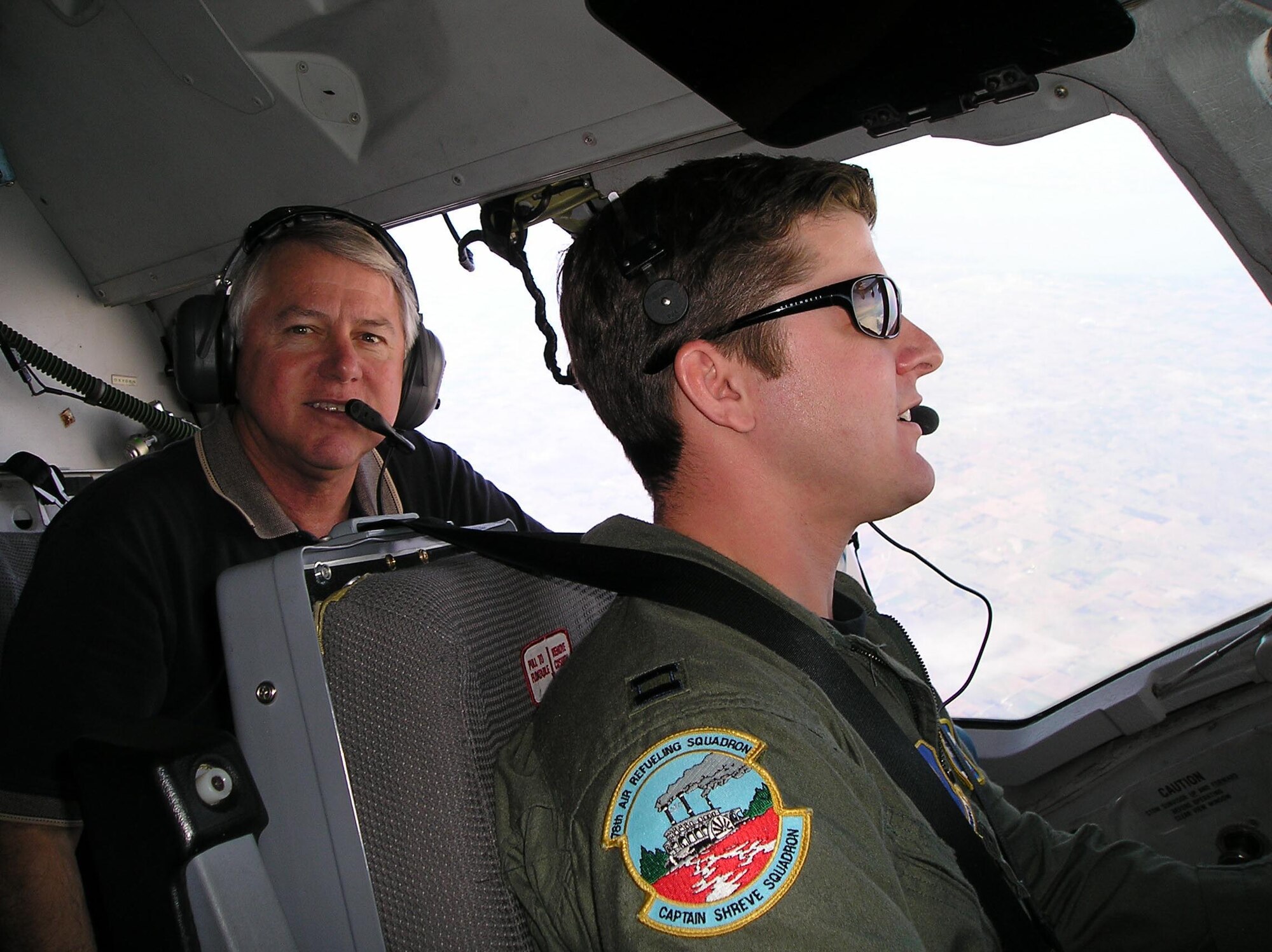 MCGUIRE AFB, N.J. -- Reserve KC-10 pilot, Capt. Michael Harston and his father, retired Chief Master Sgt. Jon Harston hook-up 30,000 feet in the air with their brother and son, respectively, who is a KC-135 boom operator. The September flight was the first time all three family members were on the same air refueling mission. USAF photo by Capt. Michael Miller