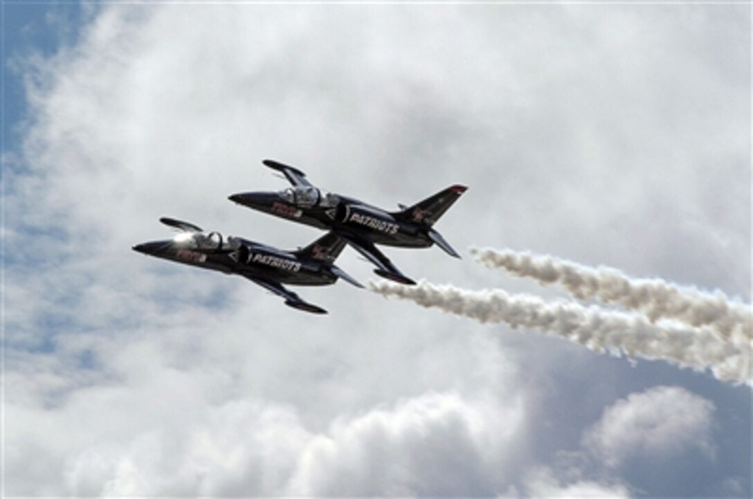 Two Patriot L-39 jets fly in formation over Marine Corps Air Station Miramar, San Diego, Oct. 14, 2006. The Miramar Air Show, the largest Air Show in the country, displayed aerial acrobatics and static displays of various planes and helicopters.