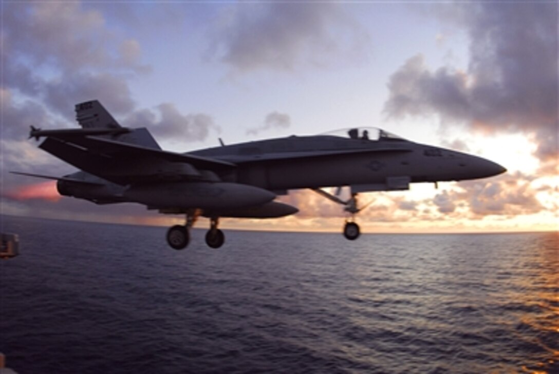 An F/A-18 Hornet assigned to the "Sunliners" of Strike Fighter Squadron 81 launches from the flight deck aboard the nuclear-powered aircraft carrier USS Nimitz, Oct. 13, 2006. Nimitz is underway conducting Tailored Ships Training Availability off the coast of southern California. 