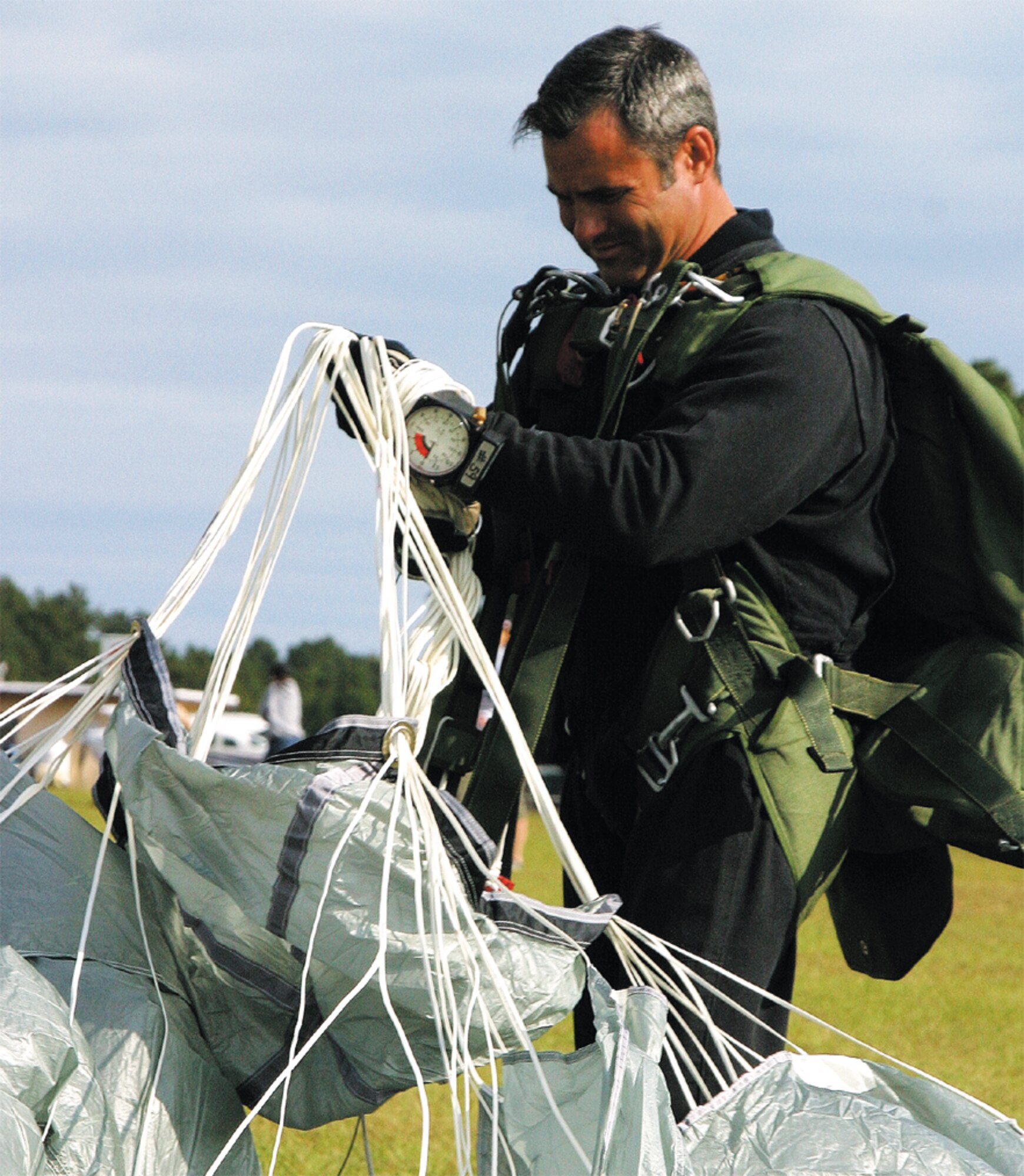 Tech. Sgt. Dennis Jones, 23rd Fighter Group SERE instructor and training manager, jumped at Raeford Drop Zone Oct. 13 with combat controllers from the 21st Special Tactics Squadron to meet his training qualifications for HALO parachute jumps. (U.S. Air Force photo/Senior Airman Stacia Zachary)