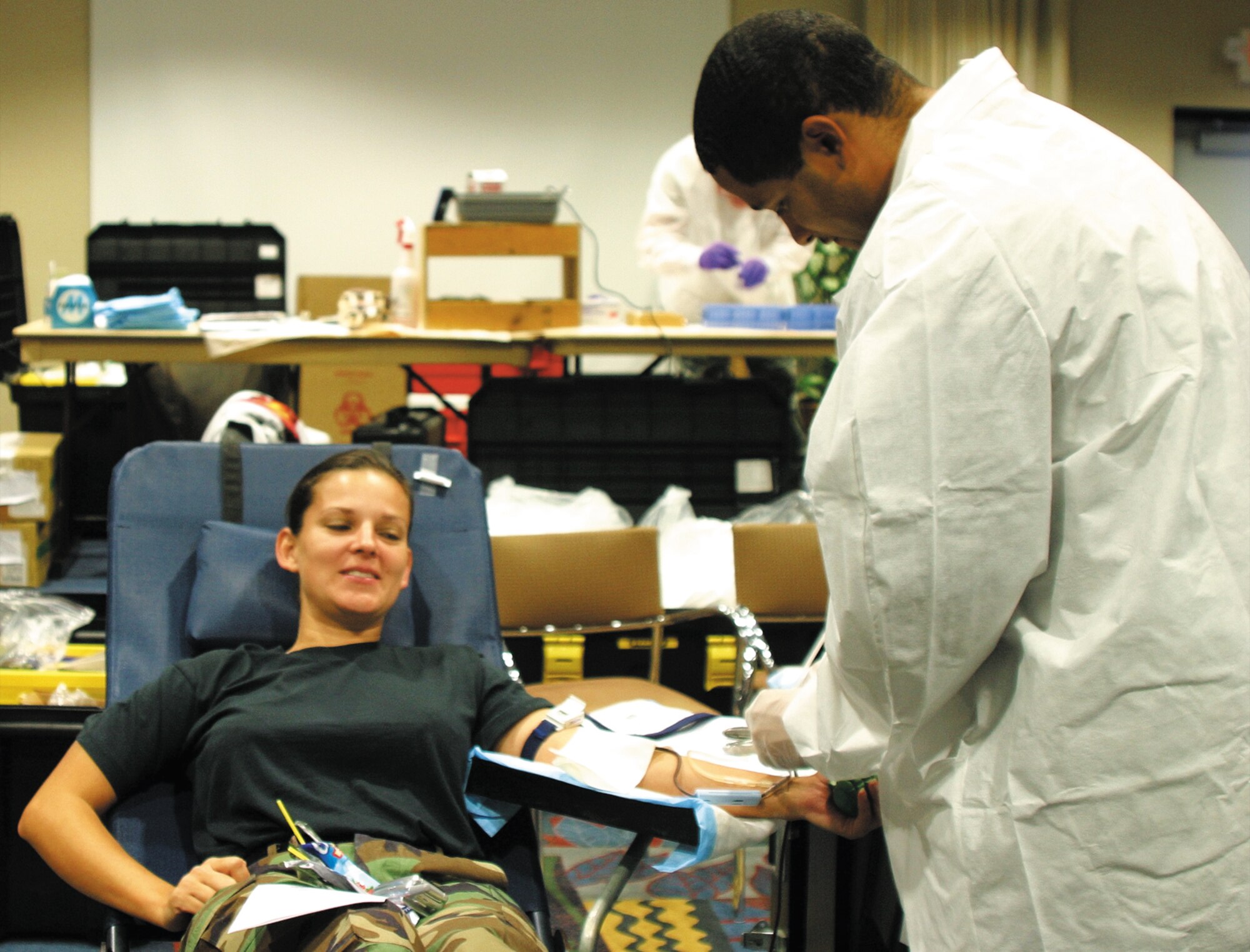 2nd Lt. Kelly Stuart was one of the first airmen in line to donate blood during the blood drive.  Over 60 people gave blood and a total of 48 pints of blood were collected. (U.S. Air Force photo/Kelly Twedell)