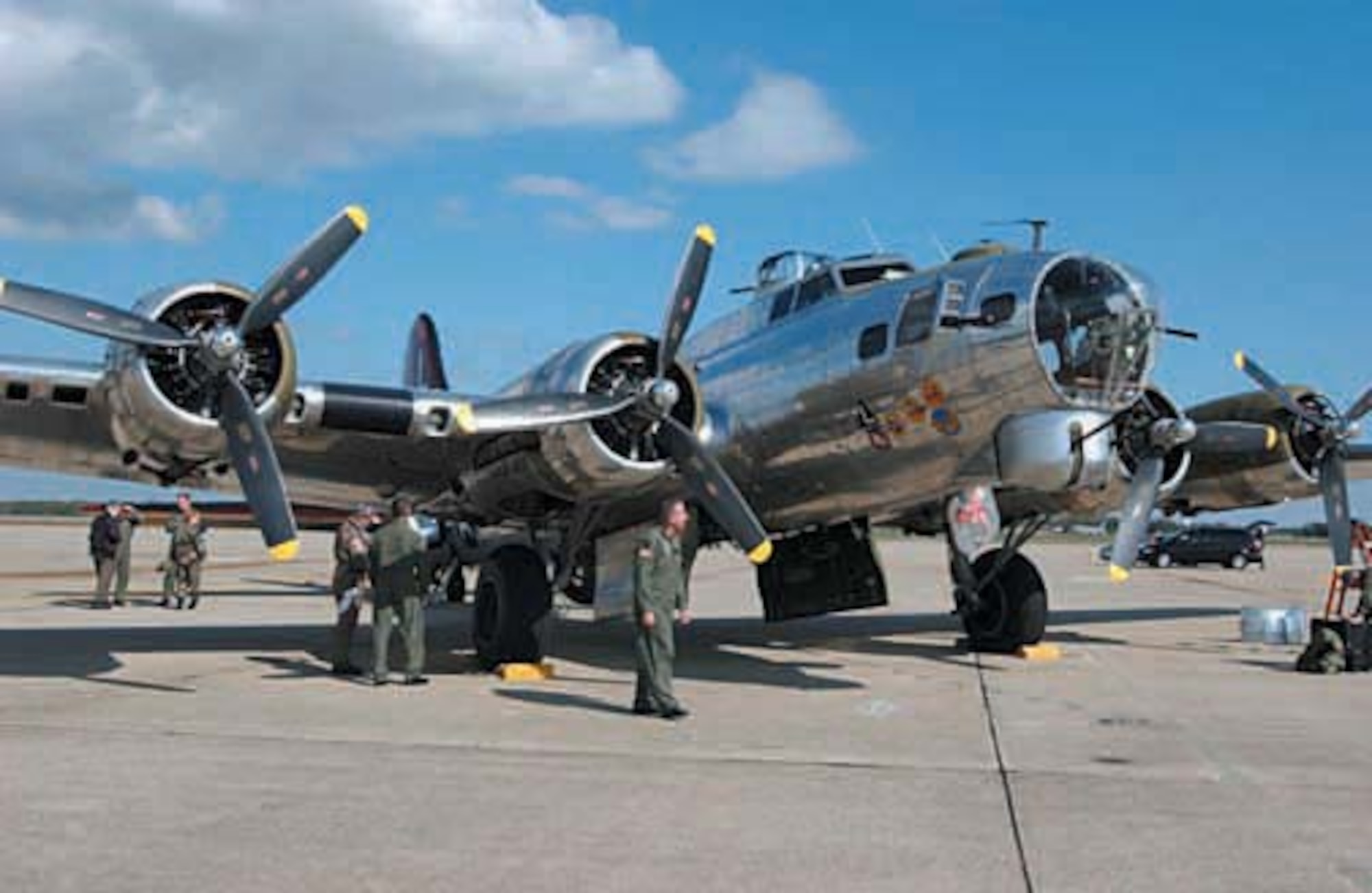 Active-duty, Air Force Reserve and Air National Guard Airmen at Andrews Air Force Base, Md., get a close up look at a Boeing B-17 Flying Fortress on Oct. 12, 2006.  The "Yankee Lady" is kept at the Yankee Air Museum in Belleville, Mich., and was at Andrews AFB for a flyover during the Air Force Memorial Dedication weekend at the Pentagon Oct. 14-15. (U.S. Air Force photo/Senior Airman Amaani Lyle)