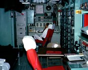 A Minuteman I launch control center, or LCC. Missile combat crews provide command and control the Minuteman system from these underground work centers, manned 24 hours per day, 365 days per year, which are geographically separated from the missiles in the crew's flight area. Missiles reside underground in launch facilities.