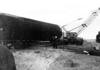 Construction of missile complex launch facilities, or "silos," in the late 1950s.  Launch facilities would house Minuteman I missiles, geographically separated from their command and control element at flight area Missle Alert Facilities and underground launch control centers.