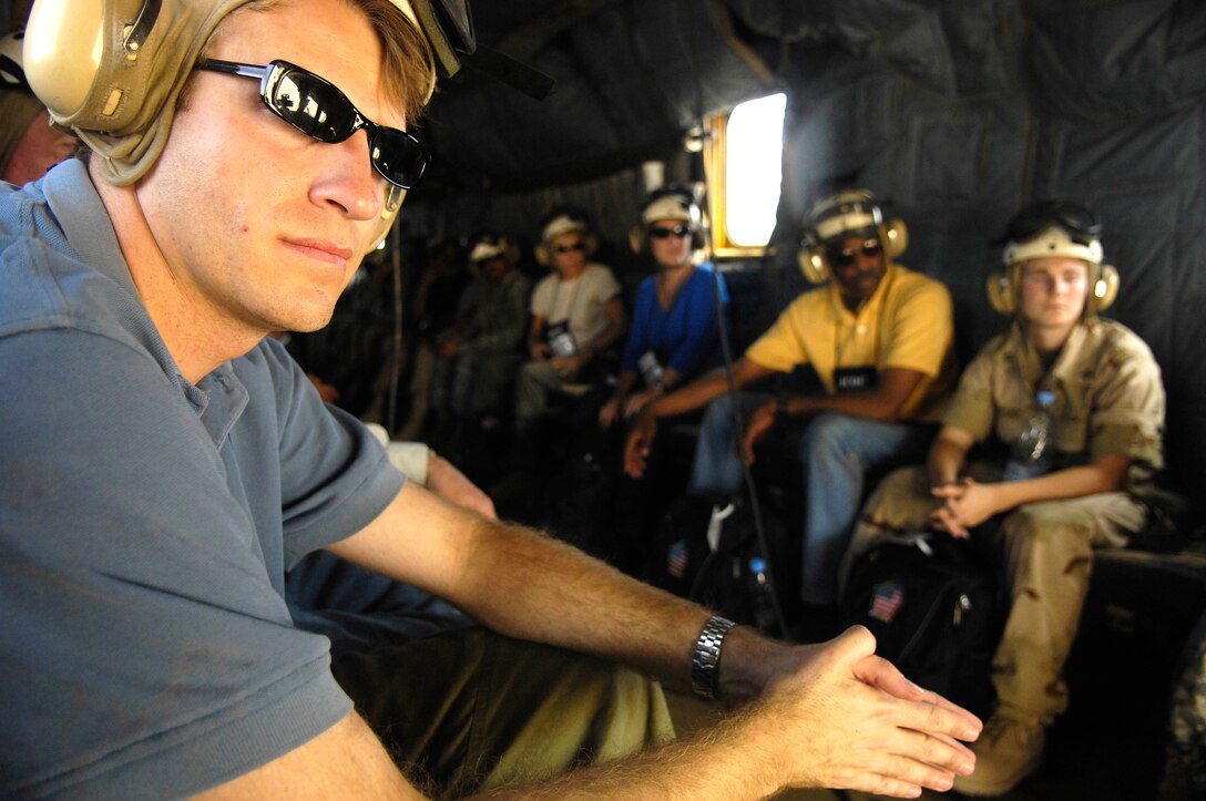 Mark Vlasic, White House fellow and participant of the Joint Civilian Orientation Conference 72, flies in a MH-53 Sea Dragon over Kuwait, Oct. 19, 2006.