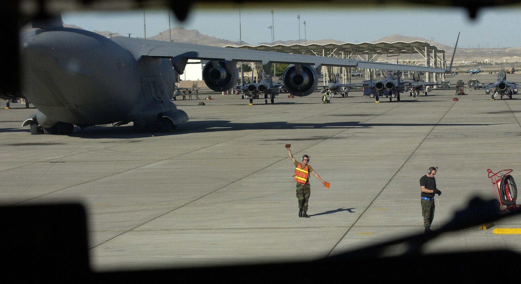 Airmen marshal in a KC-135 Stratotanker Oct. 19 during Red Flag 07-1 at Nellis Air Force Base, Nev. (U.S. Air Force photo/Master Sgt. Kevin J. Gruenwald)







