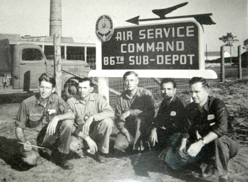 TYNDALL AFB, Fla. --  A group of Airmen pose underneath a sign during the World War II era. Tyndall has been training Airmen for more than 60 years. (Photo courtesy of 325th Fighter Wing historian office)