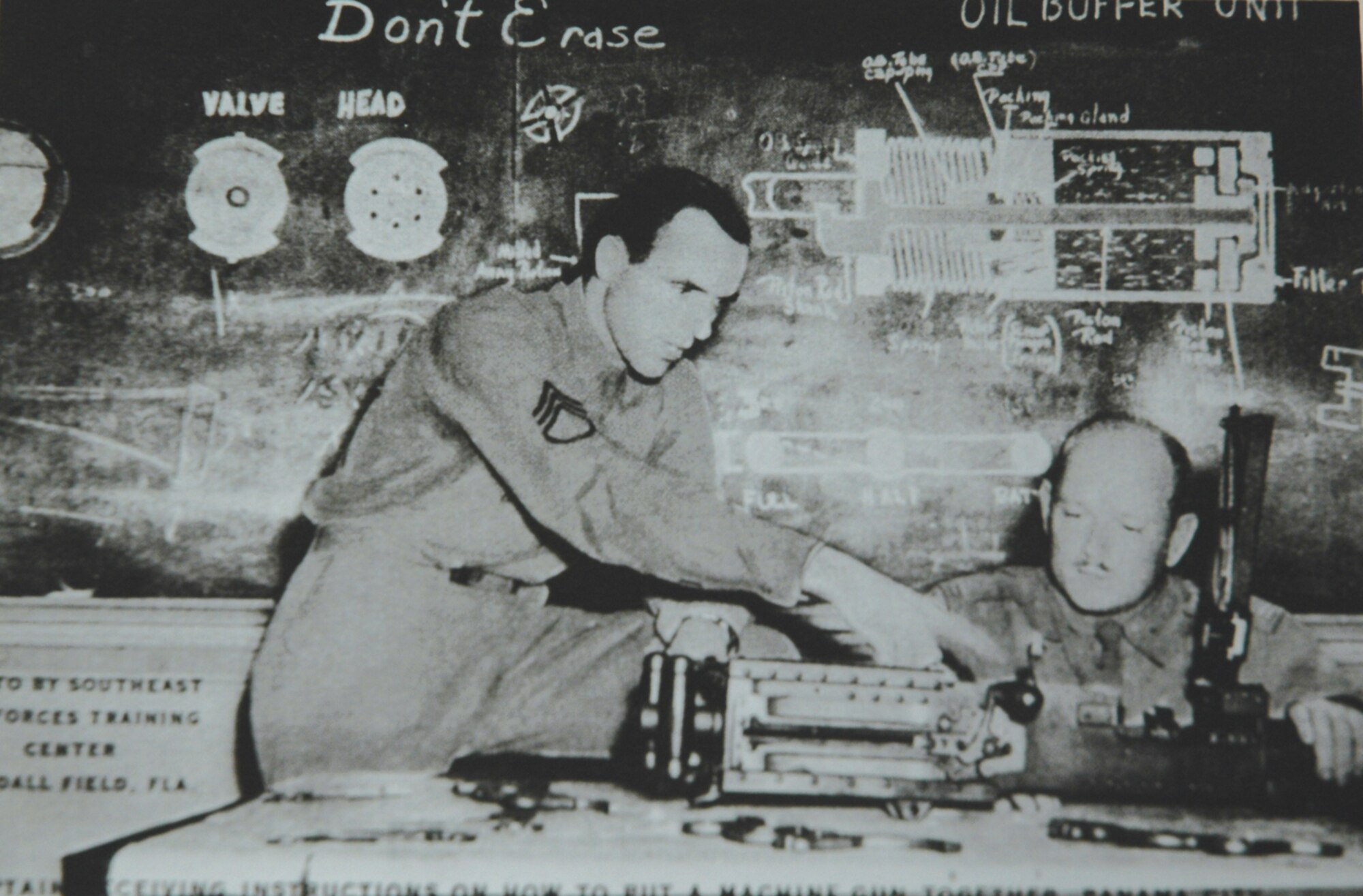 TYNDALL AFB, Fla. --  A captain is taught how to assemble a machine gun here in the 1940s. Tyndall has been a training base for more than 60 years. (Photo courtesy of 325th Fighter Wing historian office)