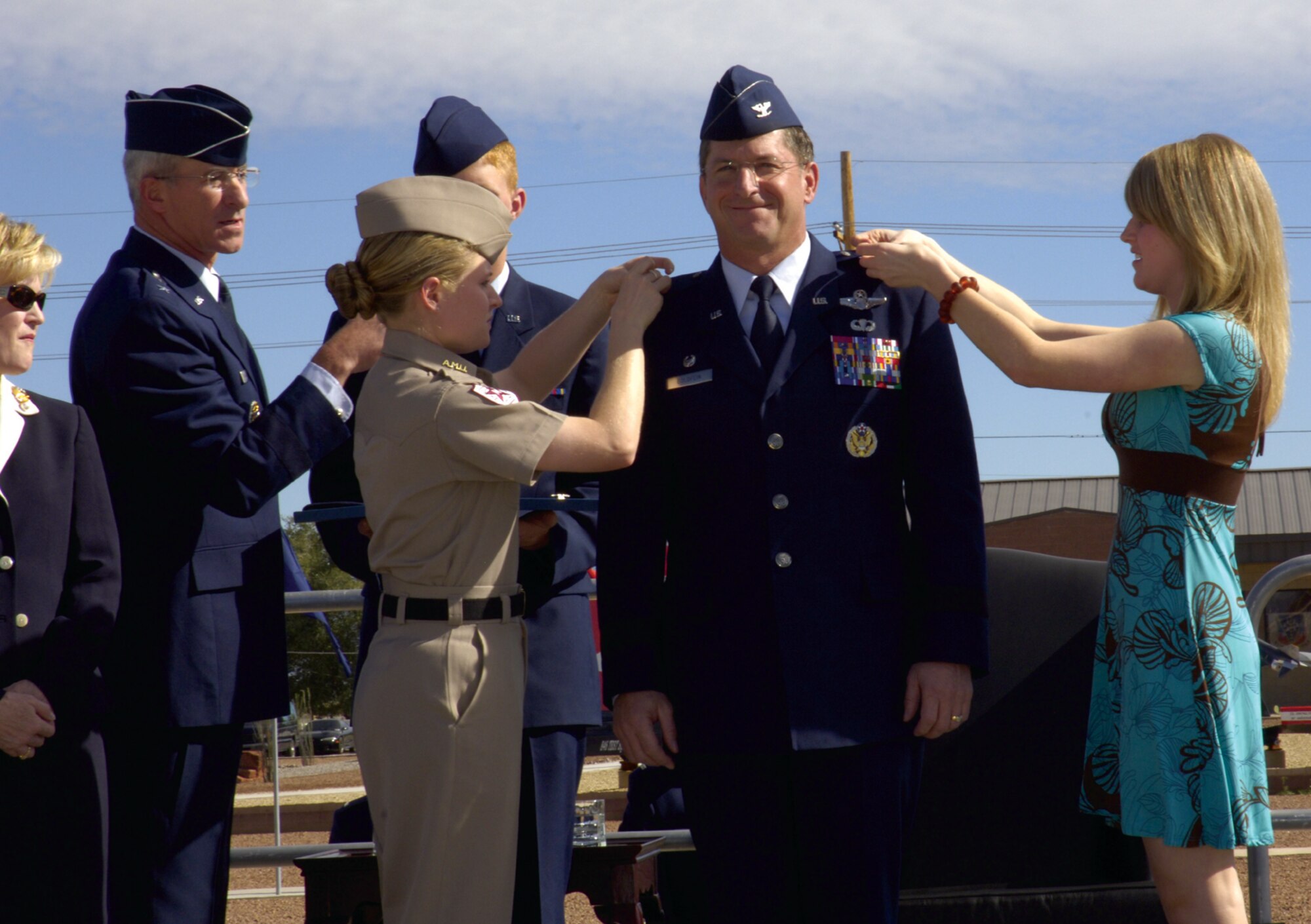 Brig. Gen. David Goldfein, 49th Fighter Wing commander, is pinned on by his two daughters, Danielle and Diana Goldfein, during his promotion ceremony Oct. 13 at Heritage Park.