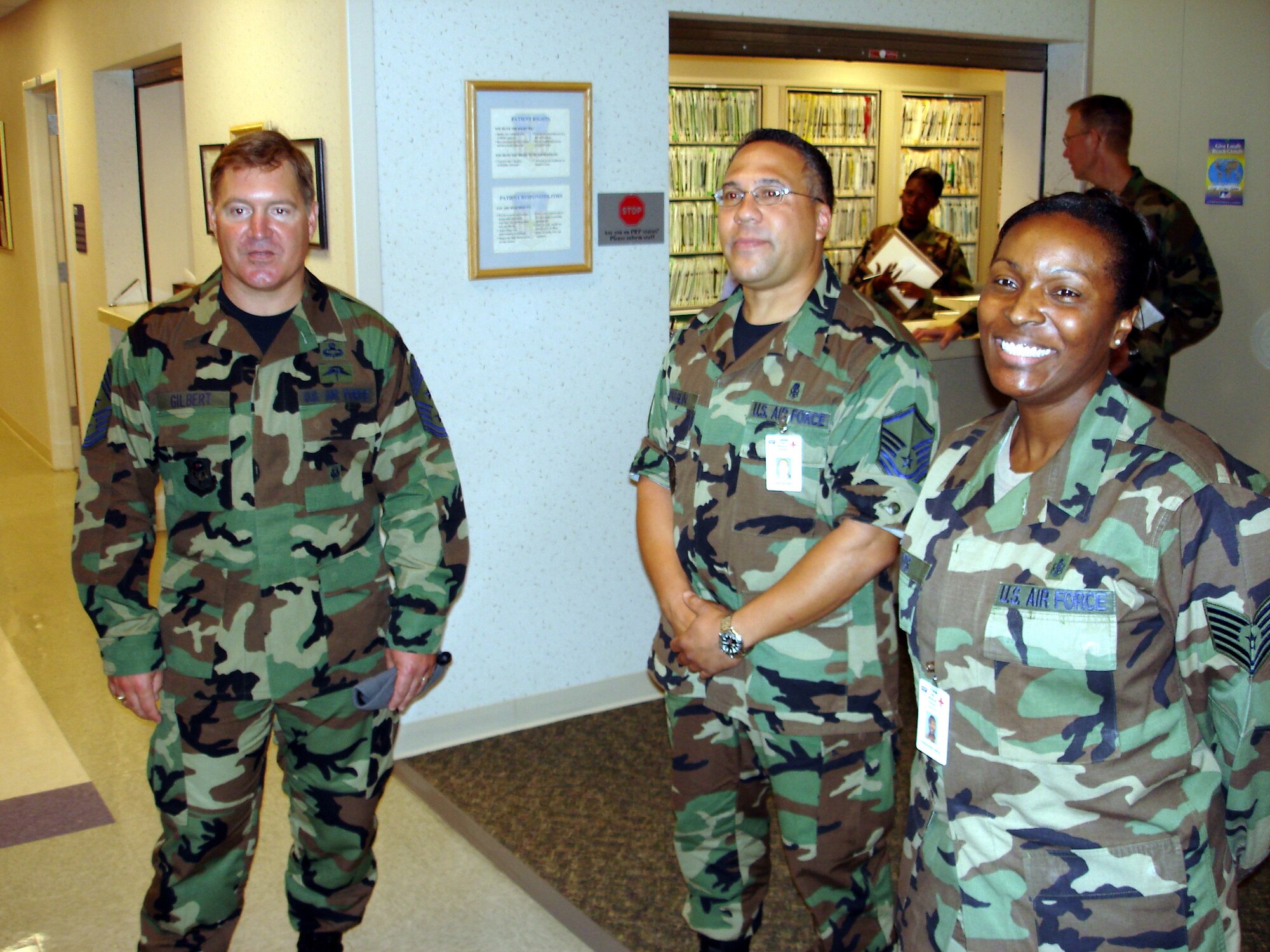 Chief Master Sgt. Michael Gilbert, Air Force Special Operations Command command chief, met with Master Sgt. Spraglin and Tech. Sgt. Cassandra Amos, 16th Special Operations Squadron, during his day-long visit Wednesday with the 16th Special Operations Wing.  Chief Gilbert was being briefed on how the dental clinic supports the Airmen of Hurlburt Field. (U.S. Air Force Photograph by Senior Master Sgt. Lynn Lawrence) 