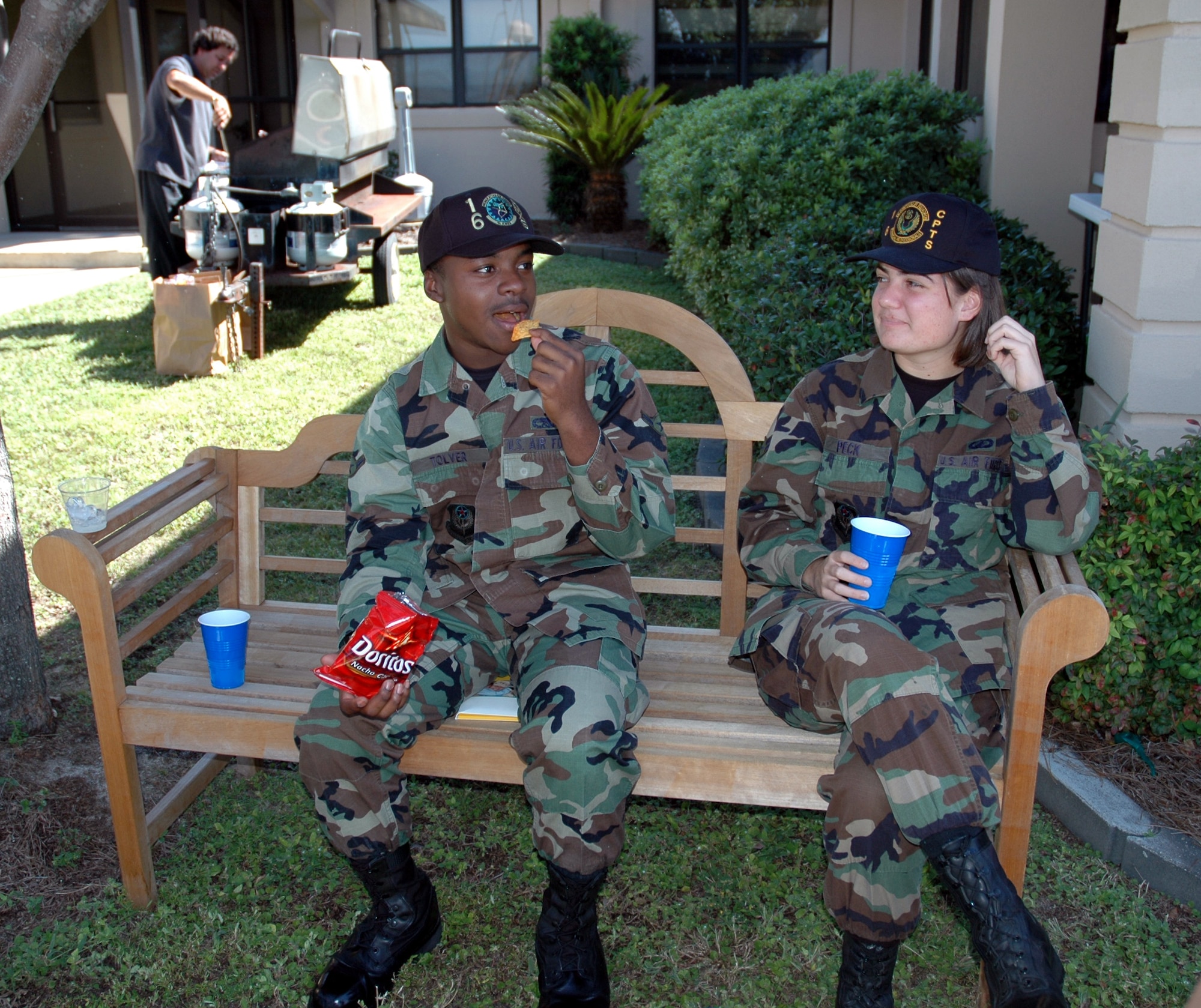 Two Airmen enjoy lunch at the Airman and Family Readiness Center grand opening Oct. 12.  The focus will now include the single Airman. (U.S. Air Force Photograph by Jamie Haig)