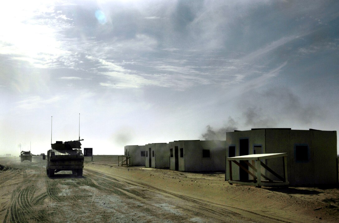 U.S. Army soldiers, with the 1st Calvary Division, go on a training convoy with participants of the Joint Civilian Orientation Conference 72, at Forward Operating Base Dagger, Kuwait, Oct. 19, 2006. 
