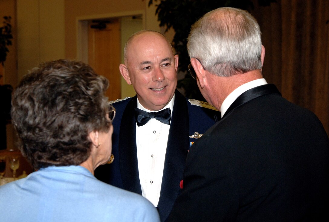 Air Force Chief of Staff General T. Michael Moseley talks with guests before dinner at the Air Force Villages dinner Oct. 20, 2006 at Lackland Air Force Base, Texas. The Villages offer premier active living communities for retired and honorably seperated officers and their spouses, widows and widowers over the age of 62. (U.S. Air Force photo/Tech. Sgt. Larry A. Simmons)