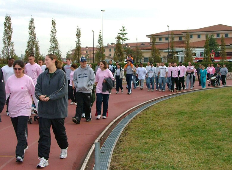 More than 200 Airmen and family members at Aviano Air Base, Italy, put their best foot forward to help raise awareness of and donations for breast cancer issues during an Aviano Community Enlisted Spouses Club-sponsored walk Oct. 21. (U.S. Air Force photo/Senior Airman Colleen Wieman)