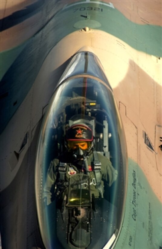 An F-16 Fighting Falcon aircraft from the 64th Aggressor Squadron approaches the boom on a KC-135 Stratotanker aircraft to refuel during Exercise Red Flag 07-1 at Nellis Air Force Base on Oct. 19, 2006.  Red Flag is held at the Nevada Test and Training Range to test the war-fighting skills of aircrews from all branches of the armed forces in realistic combat situations.  