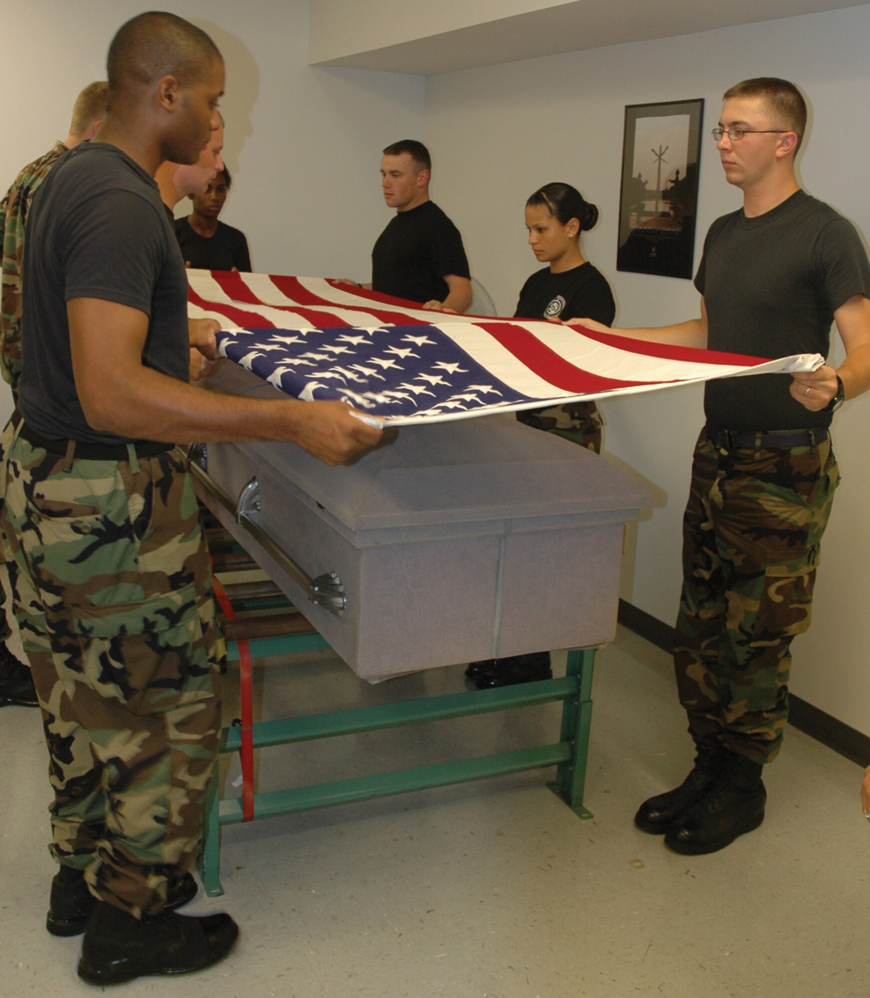 TYNDALL AFB, Fla. --  During funerals, Honor Guard members fold the American flag using the traditional triangular fold. The team practices often because each fold must be precise. (U.S. Air Force photo by 1st Lt. Amanda Ferrell)