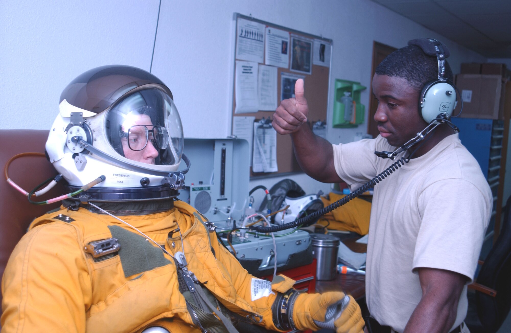 Capt. Karl Frederick, a U-2 pilot assigned to the 99th Expeditionary Reconnaissance Squadron, gets a "thumbs up" on his pressure suit Oct. 24 from Staff Sgt. Geebio Gargard, also with the 99th ERS. Captain Frederick is one of the myriad flyers supporting the vital intelligence, surveillance and reconnaissance mission in Southwest Asia. (U.S. Air Force photo/Master Sgt. Jason Tudor)