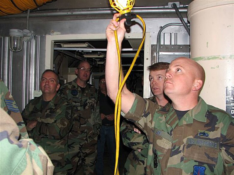 Tech. Sgt. Roy Lee, 90th Maintenance Group, inspects an S-1 blast valve during the last Peacekeeper dispatch recently.  Members of the former 90th Missile Maintenance Peacekeeper Flight completed their very last maintenance dispatch on Oct. 4, to the S-01 and P-01 missile alert facilities.