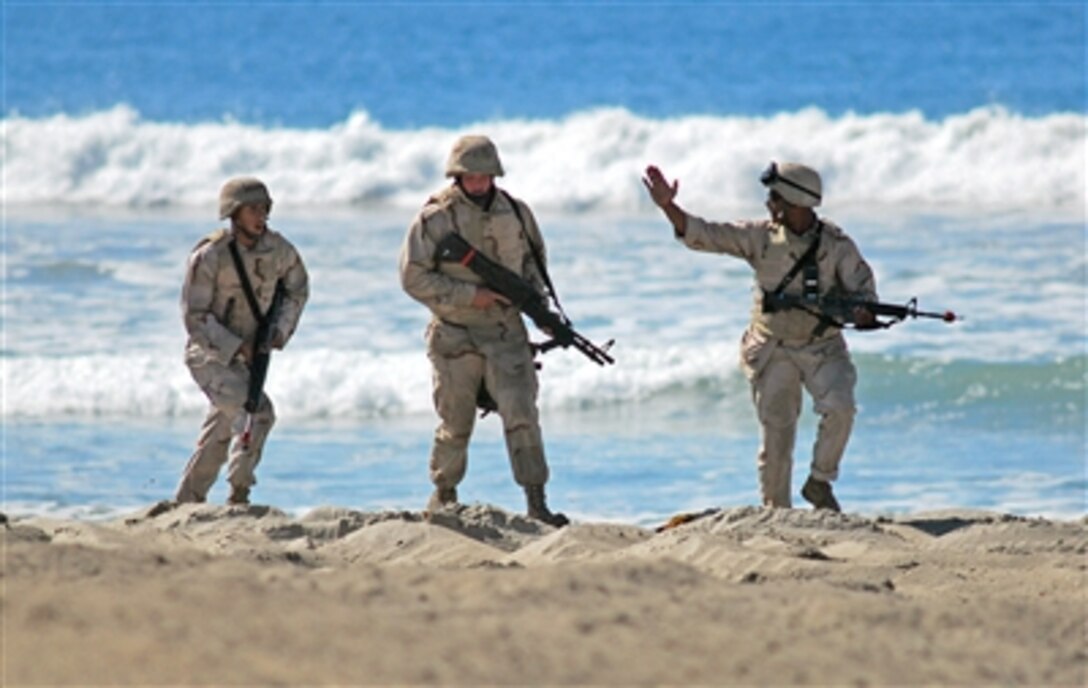 Sailors assigned to Beach Master Unit 1 participate in training exercises designed to simulate real world scenarios at Camp Pendleton, Calif., Oct. 21, 2006. More than 400 sailors came together for a Naval Beach Group field exercise aimed at improving overall combat readiness and preparing them for possible deployments in support of the war on terrorism. 