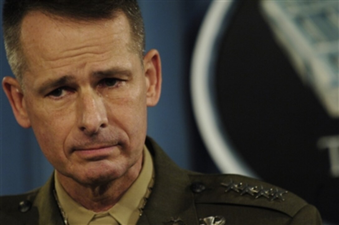 Chairman of the Joint Chiefs of Staff U.S. Marine Corps Gen. Peter Pace listens to a question during a briefing at the Pentagon, Oct. 24, 2006. The chairman said the will of the American people will prevent the enemy from meeting its objective.