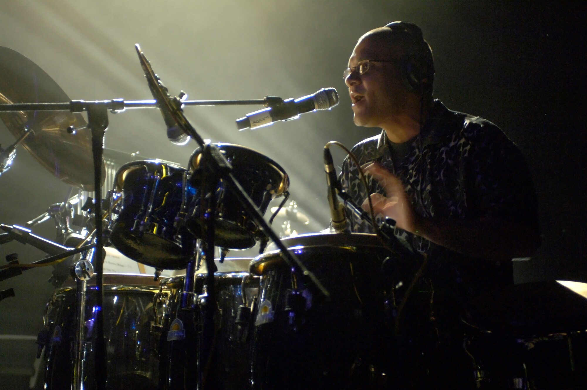 Airman 1st Class Wilfredo Cruz, percussionist and backup vocalist with Reserve Generation, plays for third through seventh grade students attending an anti-drug concert Oct. 25 at Trinity University in San Antonio.  The concert was part of National Red Ribbon Week, an anti-drug campaign focused on educating individuals, families and communities on the destructive effects of drugs and the positive alternative life choices that are available to youth.  The 2006 Red Ribbon Week runs from Oct. 23 to 29. Reserve Generation is part of the Air Force Reserve Command Band at Robins Air Force Base, Ga. (U.S. Air Force photo/Senior Airman Brian Ferguson)